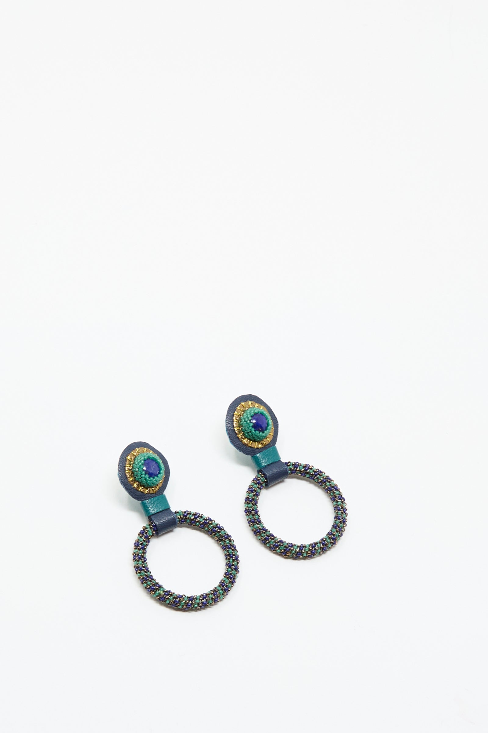Small Beaded Hoops in Blue with Lapis by Robin Mollicone—handmade in NYC, featuring blue, green, and gold beads—are shown against a plain white background.