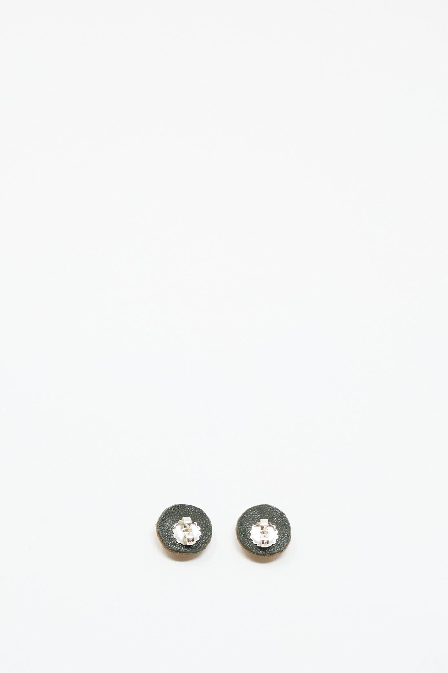 A pair of Stud Earrings in Brown with Picture Jasper by Robin Mollicone, featuring small, round handmade design and silver center, displayed on a plain white background.