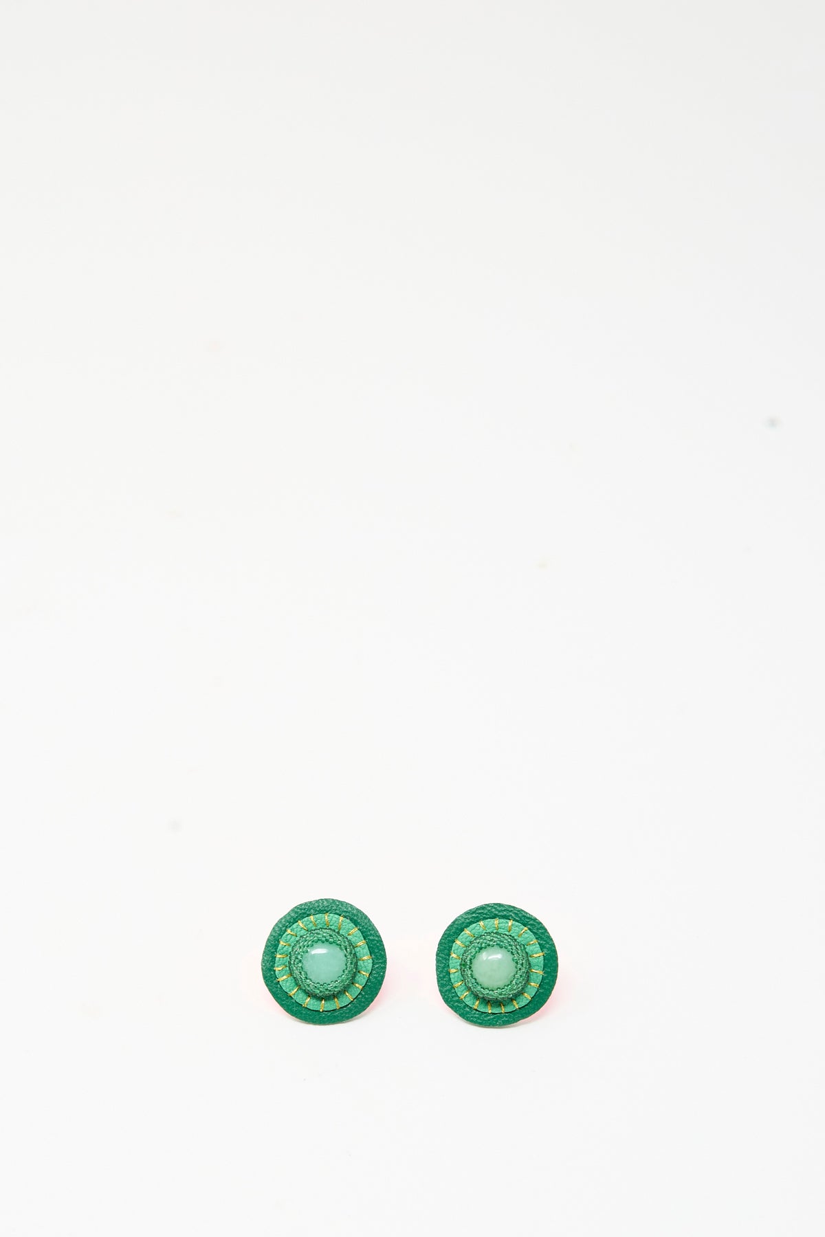 Robin Mollicone Stud Earrings in Chrysoprase featuring round green leather with a central light green stone.
