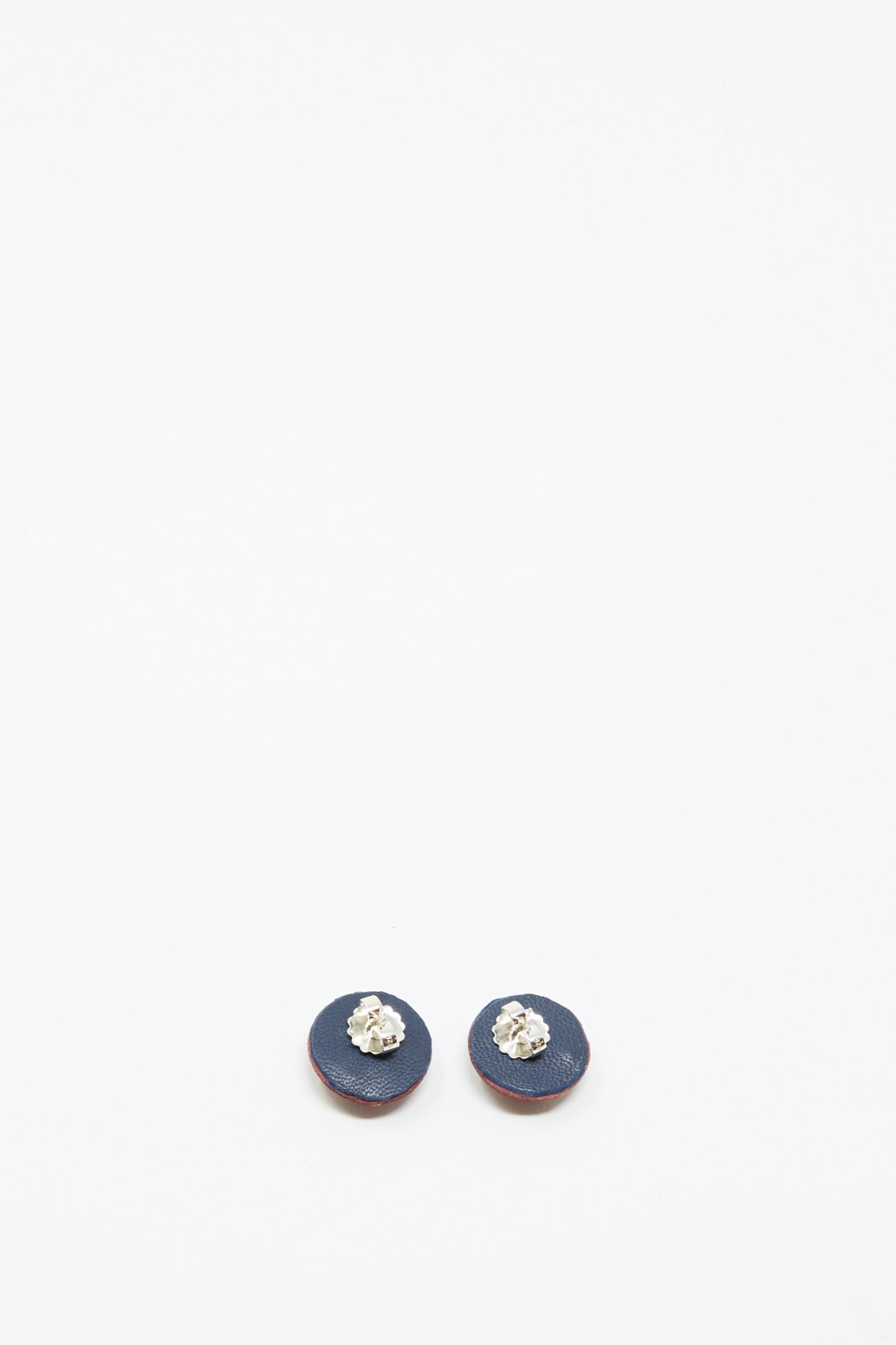 A pair of Robin Mollicone Stud Earrings in pink with carnelian accents, featuring small textured silver details, displayed on a white background.