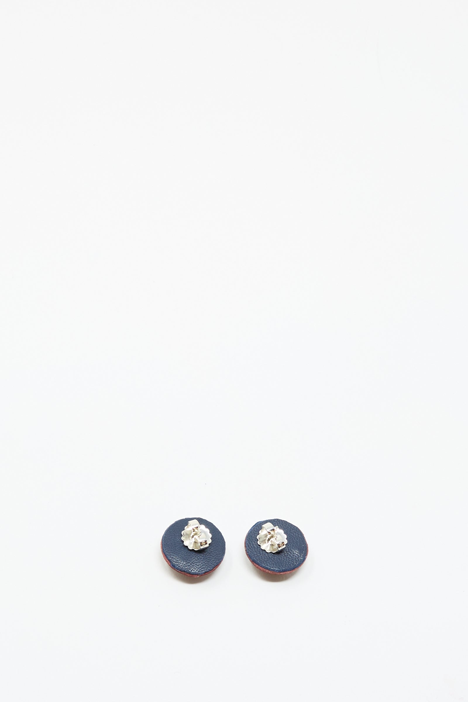 A pair of Robin Mollicone Stud Earrings in pink with carnelian accents, featuring small textured silver details, displayed on a white background.