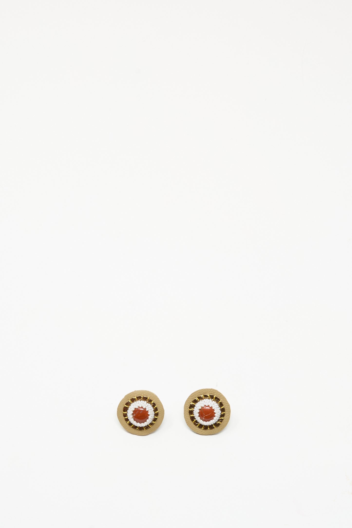 Robin Mollicone's Stud Earrings in Red Jasper showcase handmade design with a red jasper-inspired center and gold-toned outer rings, beautifully displayed on a plain white background.