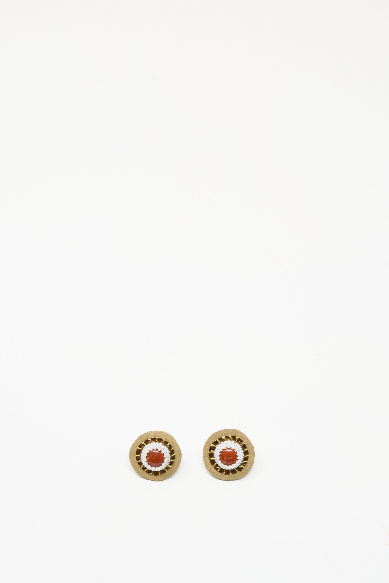 Robin Mollicone's Stud Earrings in Red Jasper showcase handmade design with a red jasper-inspired center and gold-toned outer rings, beautifully displayed on a plain white background.