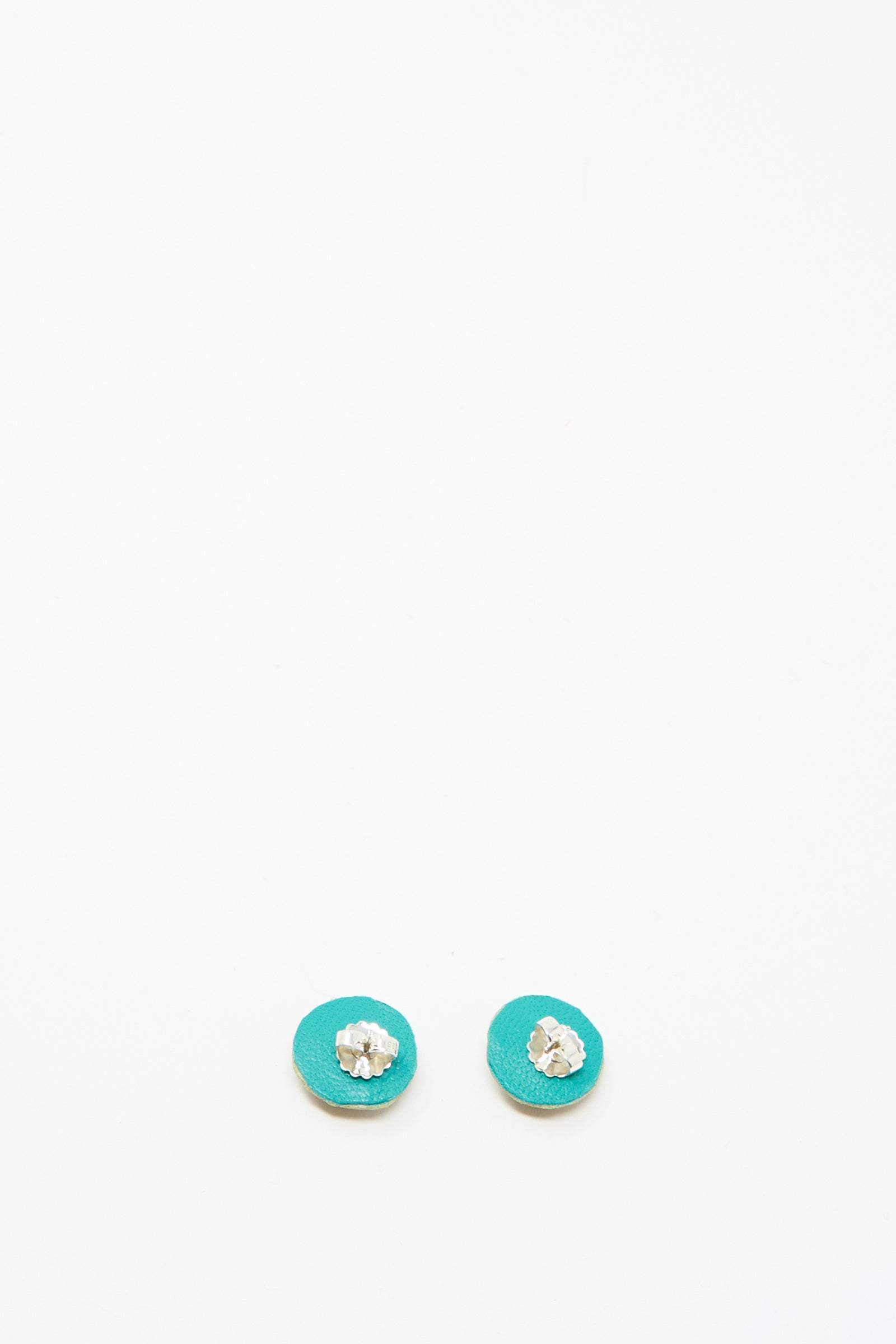 A pair of small round red jasper Stud Earrings by Robin Mollicone, featuring handmade sterling silver flower-shaped studs, displayed on a plain white background.