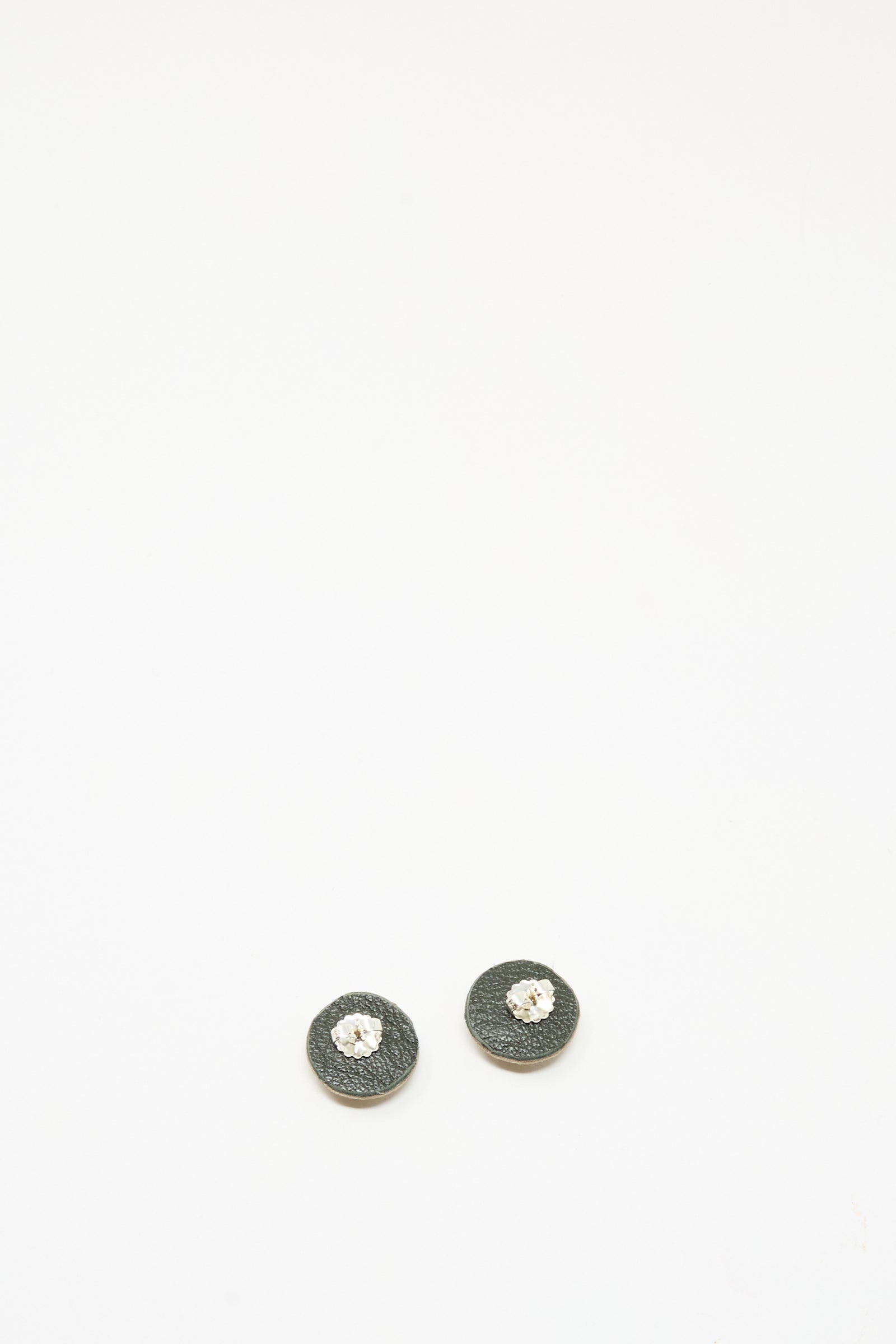 A pair of Robin Mollicone Stud Earrings in Red Jasper, handmade with a central clear gem, is displayed on a plain white background.