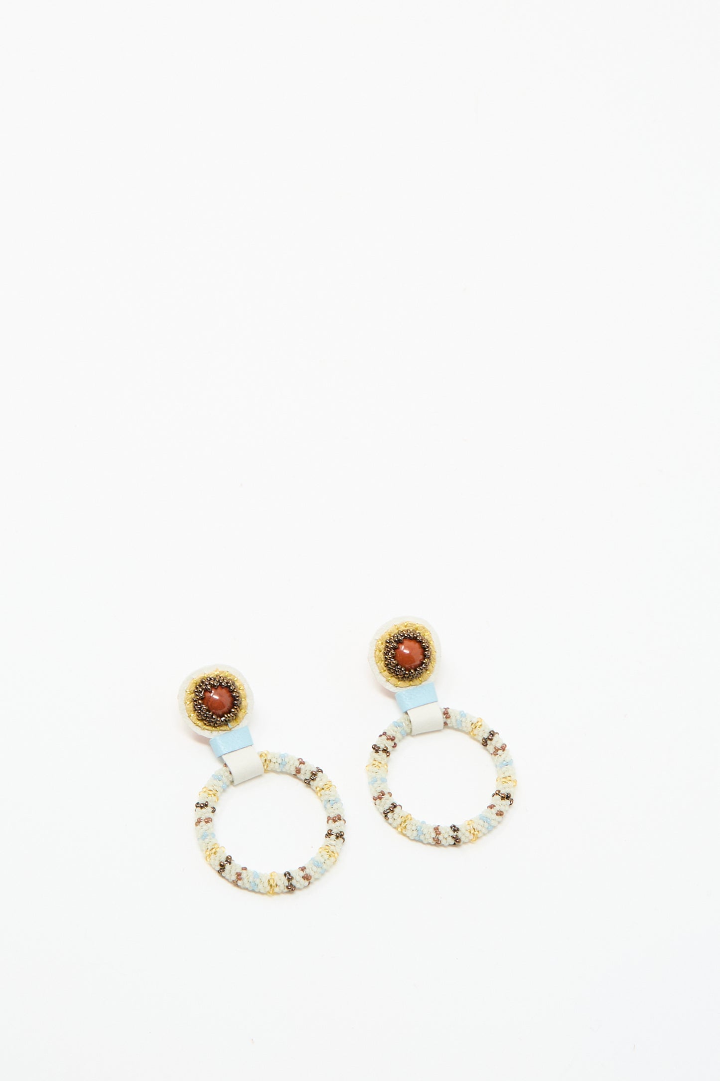 The Robin Mollicone Small Beaded Hoop Earrings in Red Jasper feature handmade brown Red Jasper stones at the center, displayed against a white background.