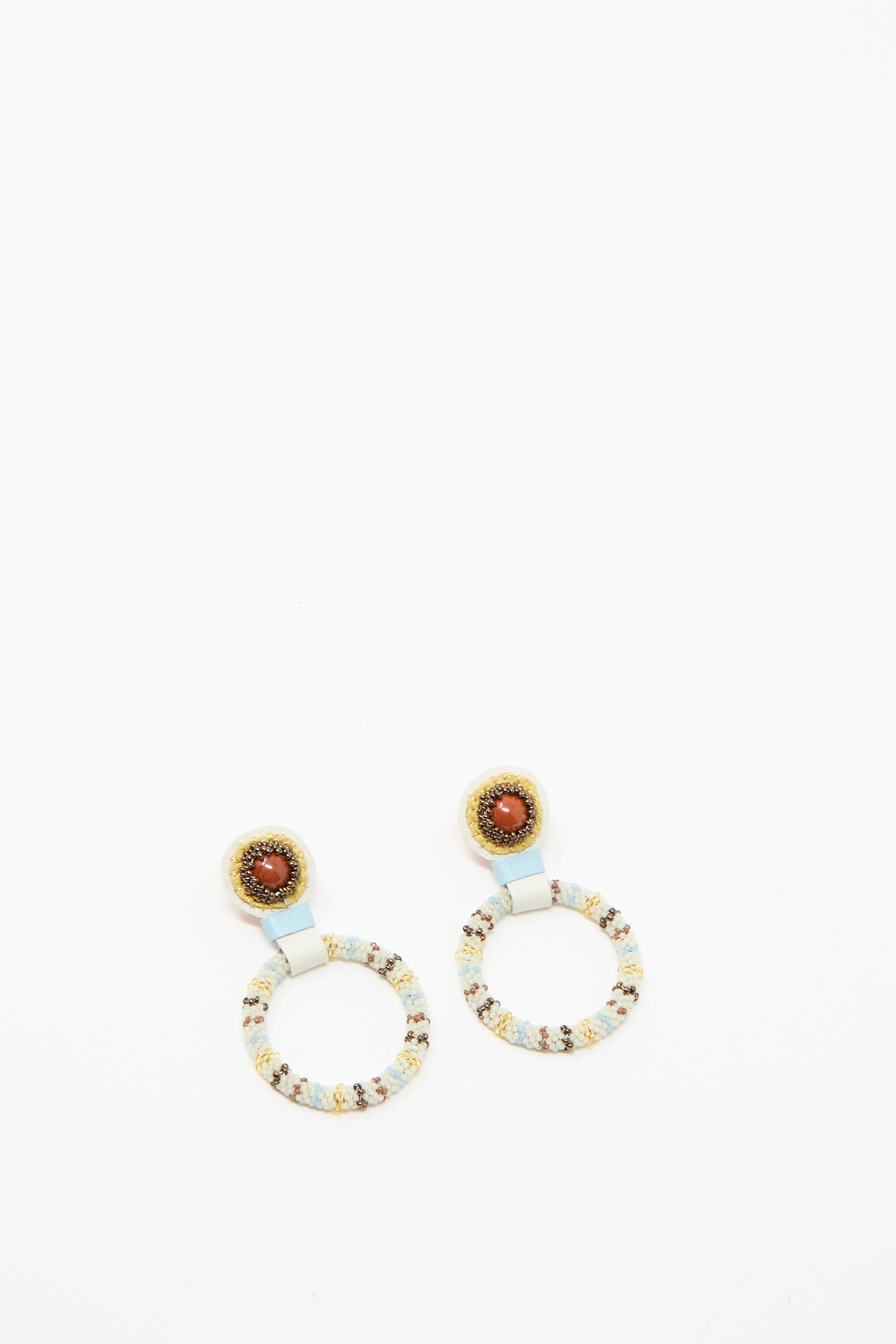 The Robin Mollicone Small Beaded Hoop Earrings in Red Jasper feature handmade brown Red Jasper stones at the center, displayed against a white background.