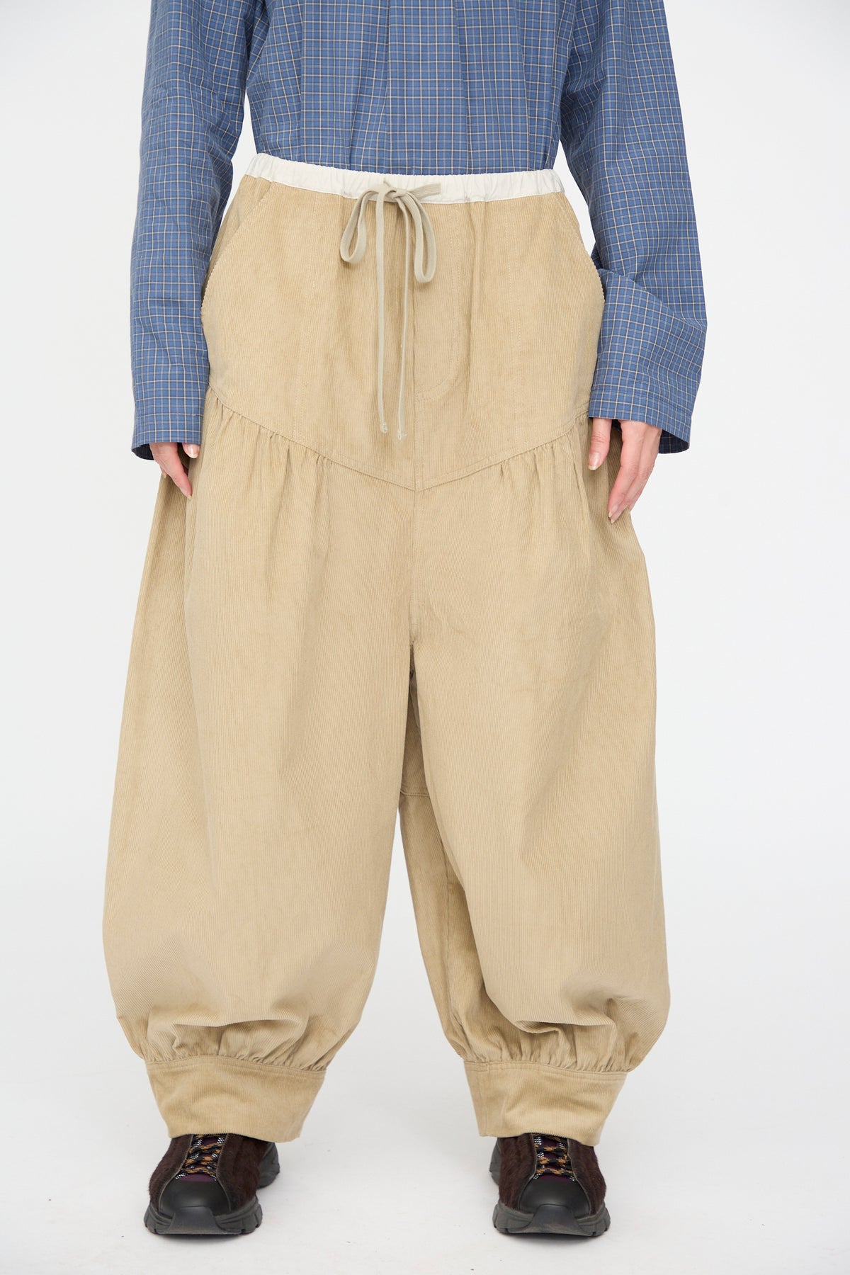 SC103 Cotton Corduroy Crescent Pants in Wheat, featuring a tan, wide-leg, oversized fit with a drawstring waist and gathered, elasticized hems.
