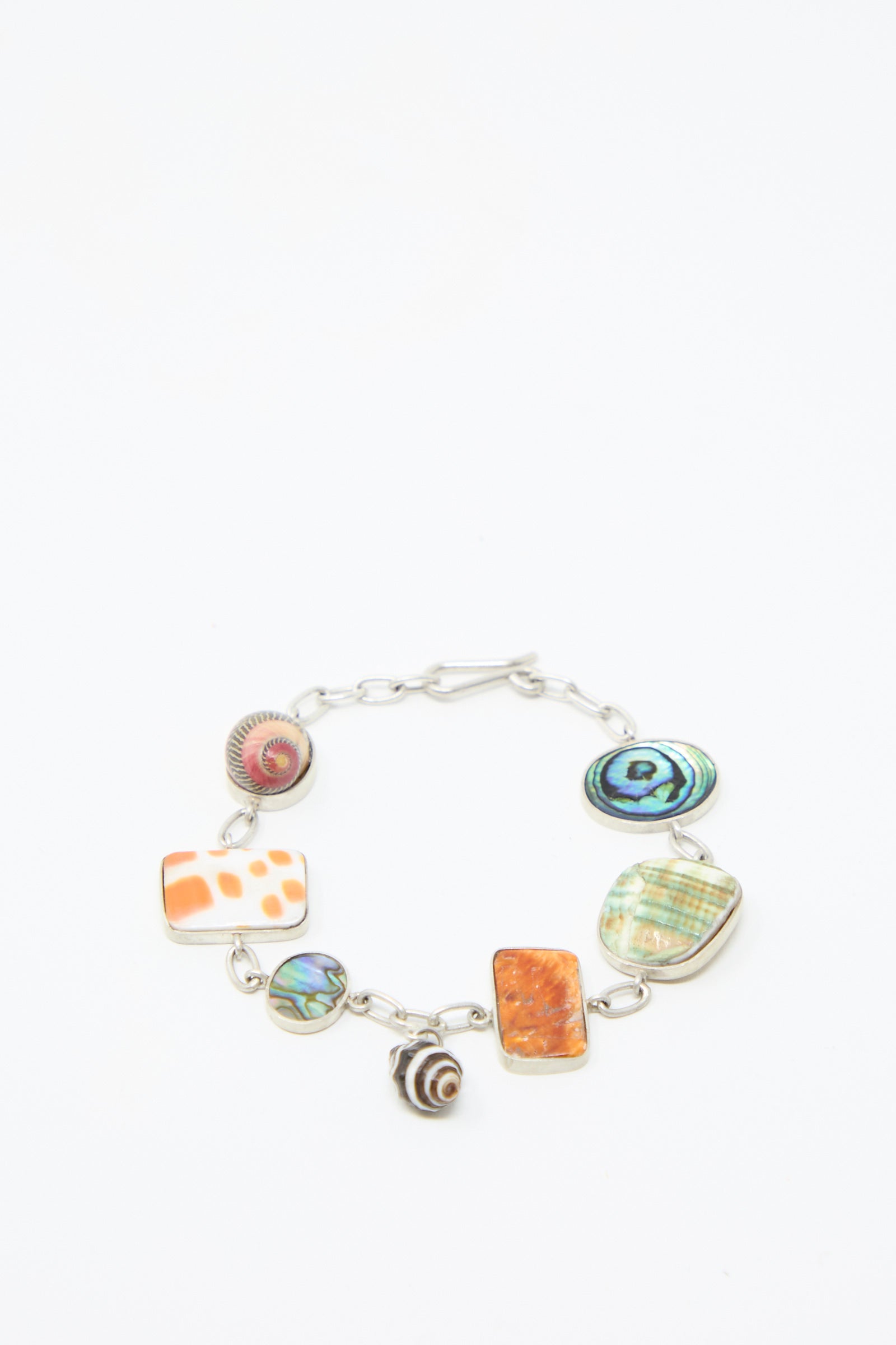 The Sterling Silver No. 001 Bracelet in Shell I by La Ma r, a multi-colored shell bracelet. Handmade in Mexico.