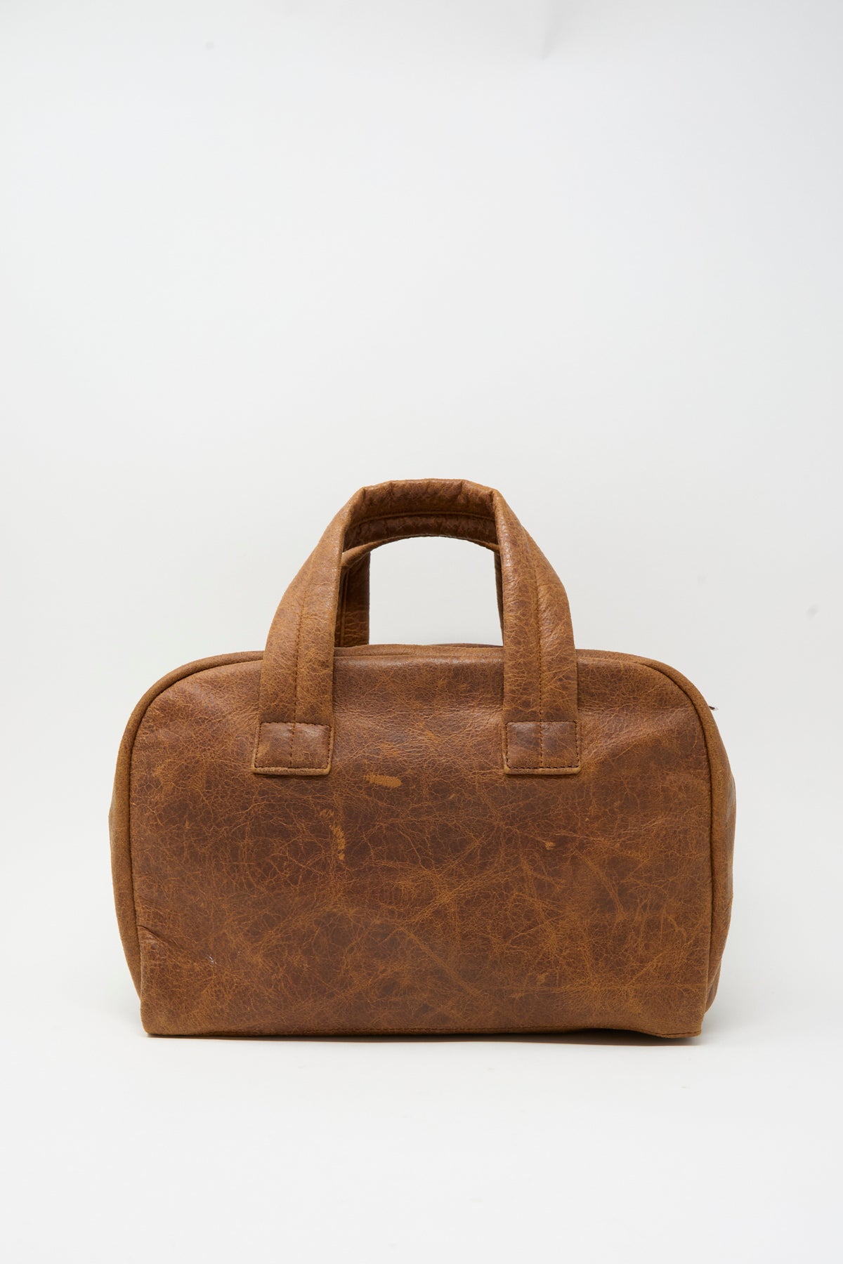 Sabina Leather The Bowling Bag in brown with two short top handles.