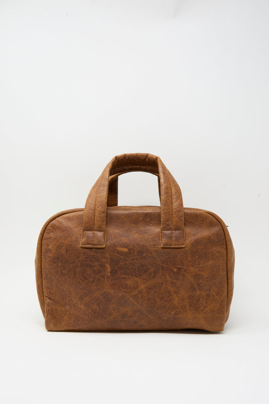 Sabina Leather The Bowling Bag in brown with two short top handles.