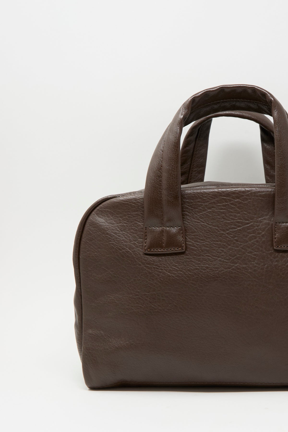 Sabina Leather The Bowling Bag in dark brown with two top handles.