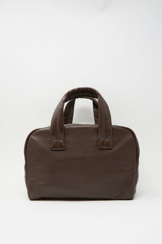 Dark brown Leather The Bowling Bag by Sabina with two top handles.