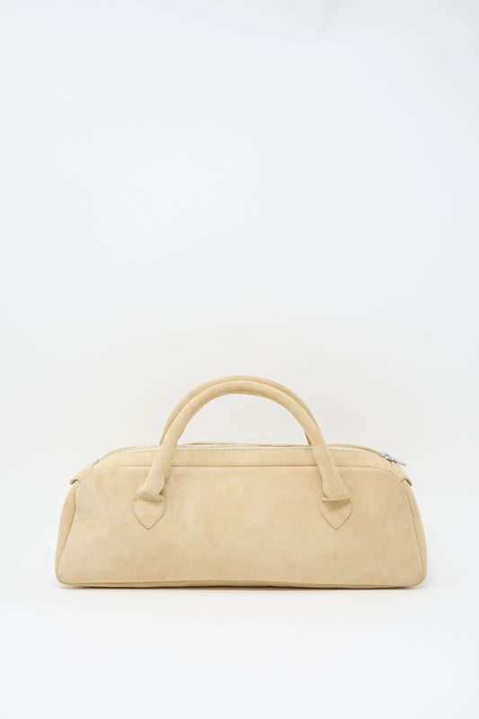 Sabina Suede The Bottle Bag in cream, featuring a top zipper and two handles.