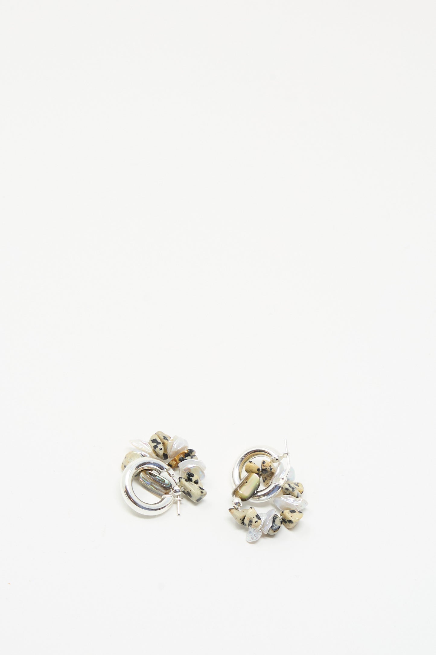 The Santangelo Che Bomba Earrings in Abalone Hoop, crafted from sterling silver with delicate details, are shown against a plain white background.