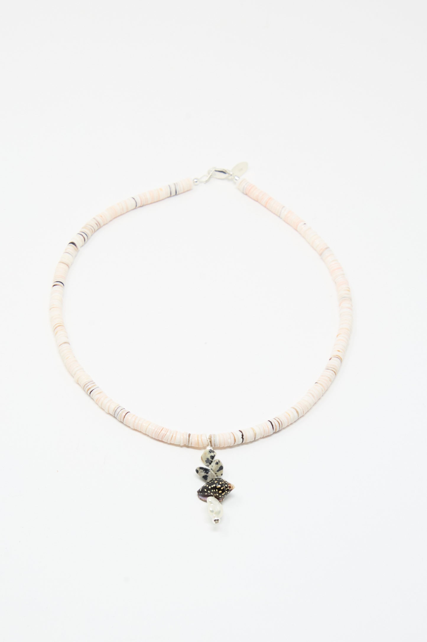 The Santangelo Pronto Necklace in Heishi Dalmatian Stack features light-colored heishi shell beads and a black-and-white dalmatian jasper charm, beautifully displayed on a white background.