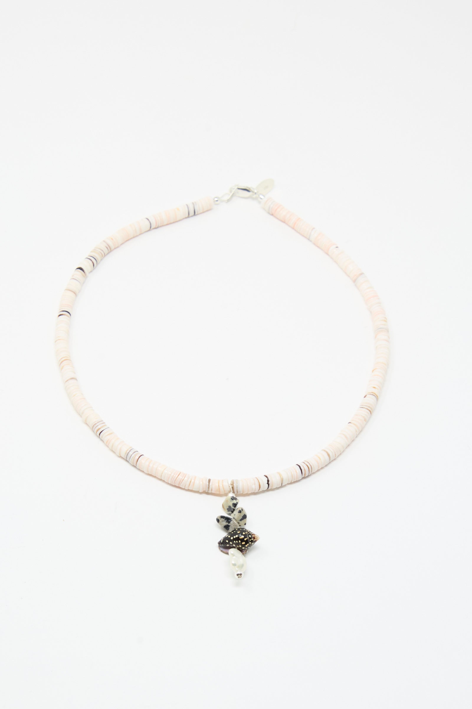 The Santangelo Pronto Necklace in Heishi Dalmatian Stack features light-colored heishi shell beads and a black-and-white dalmatian jasper charm, beautifully displayed on a white background.
