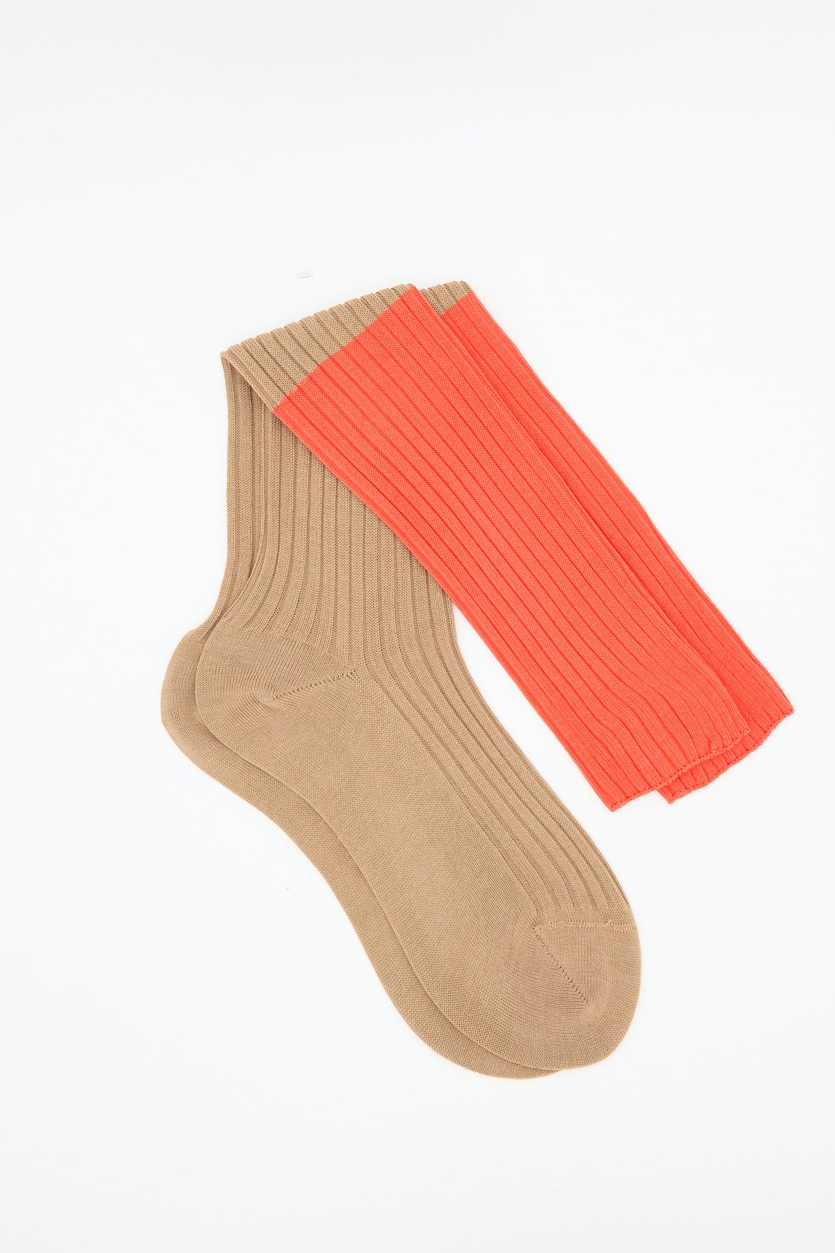 Sofie D’Hoore Bi-Colored Friday Socks in Camel: ribbed cotton crew socks with a tan foot and a bright orange cuff.