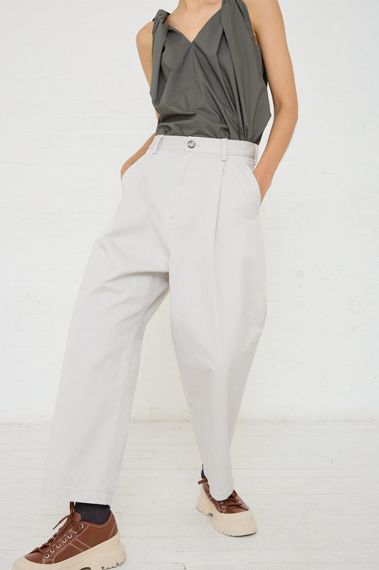 The model is wearing Sofie D'Hoore's Cotton Twill Proof Pant in Mastic.