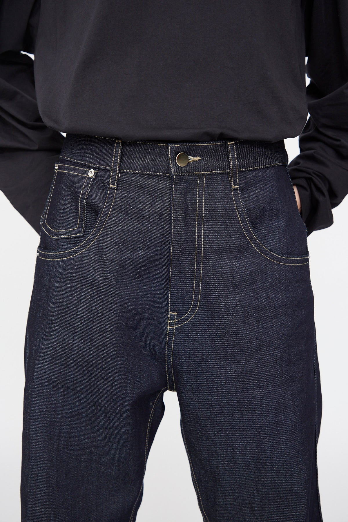 Sofie D’Hoore Raw Denim Phill Pant in Midnight: a dark indigo straight leg raw denim pants with contrast stitching, button closure, and a small coin pocket.