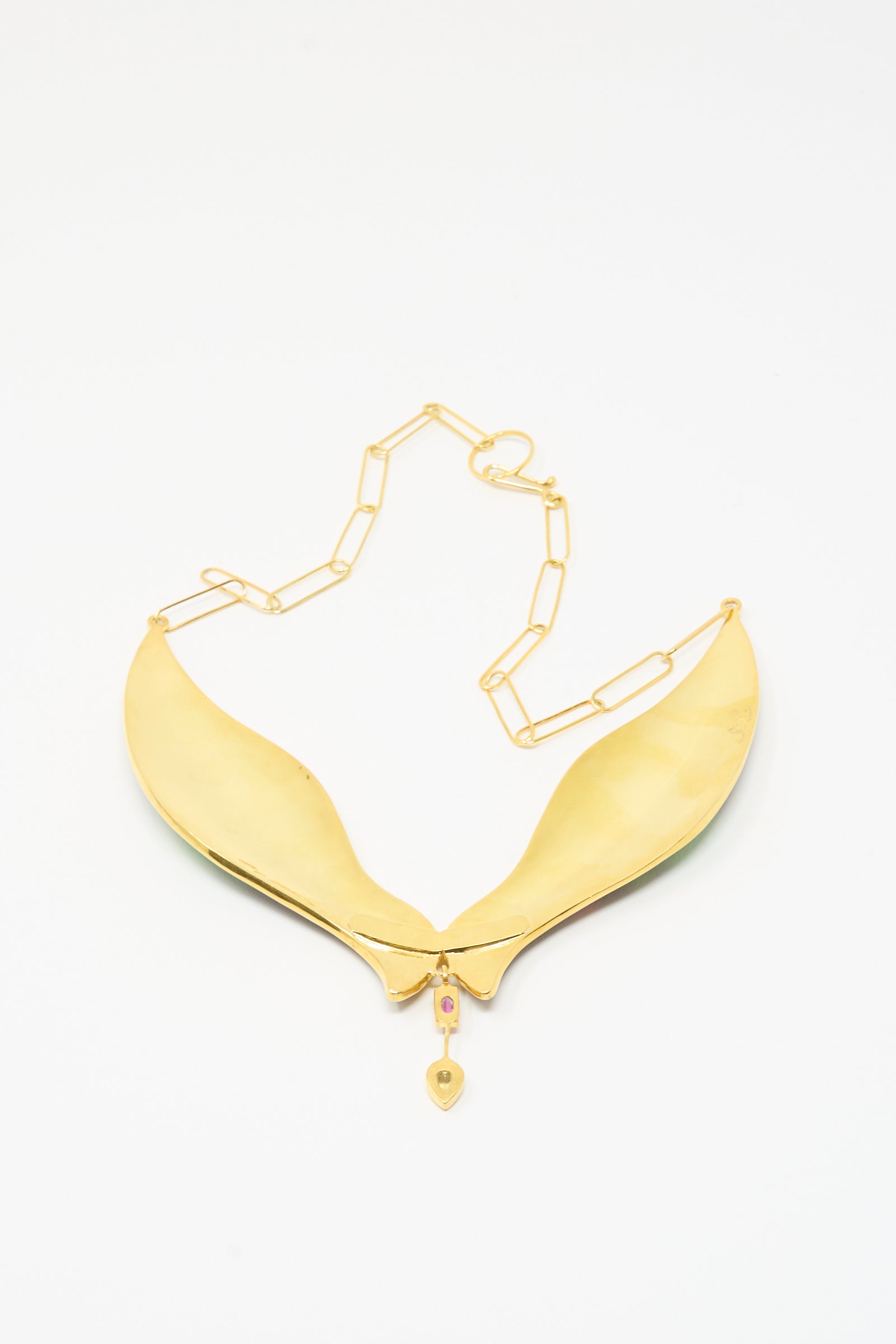 The Bird Necklace in Black and Red Flower by Sofio Gongli features a wide, curved 14K gold plated pendant on a geometric link chain, inspired by classic cloisonné designs and shown on a white background.