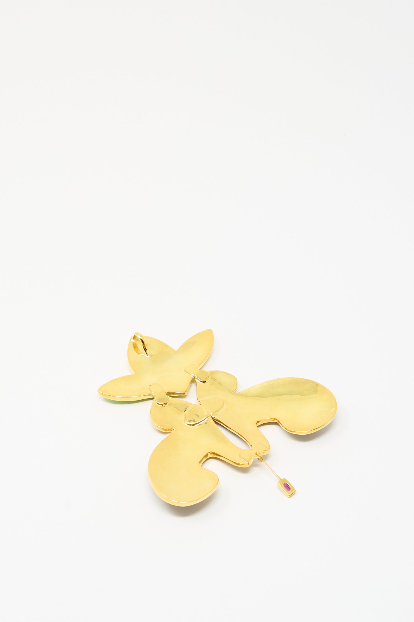 Sofio Gongli Leopard and Flower Pendant earring with a gold-tone abstract shape, 14K gold plated finish, and dangling detail, shown on a plain white background.
