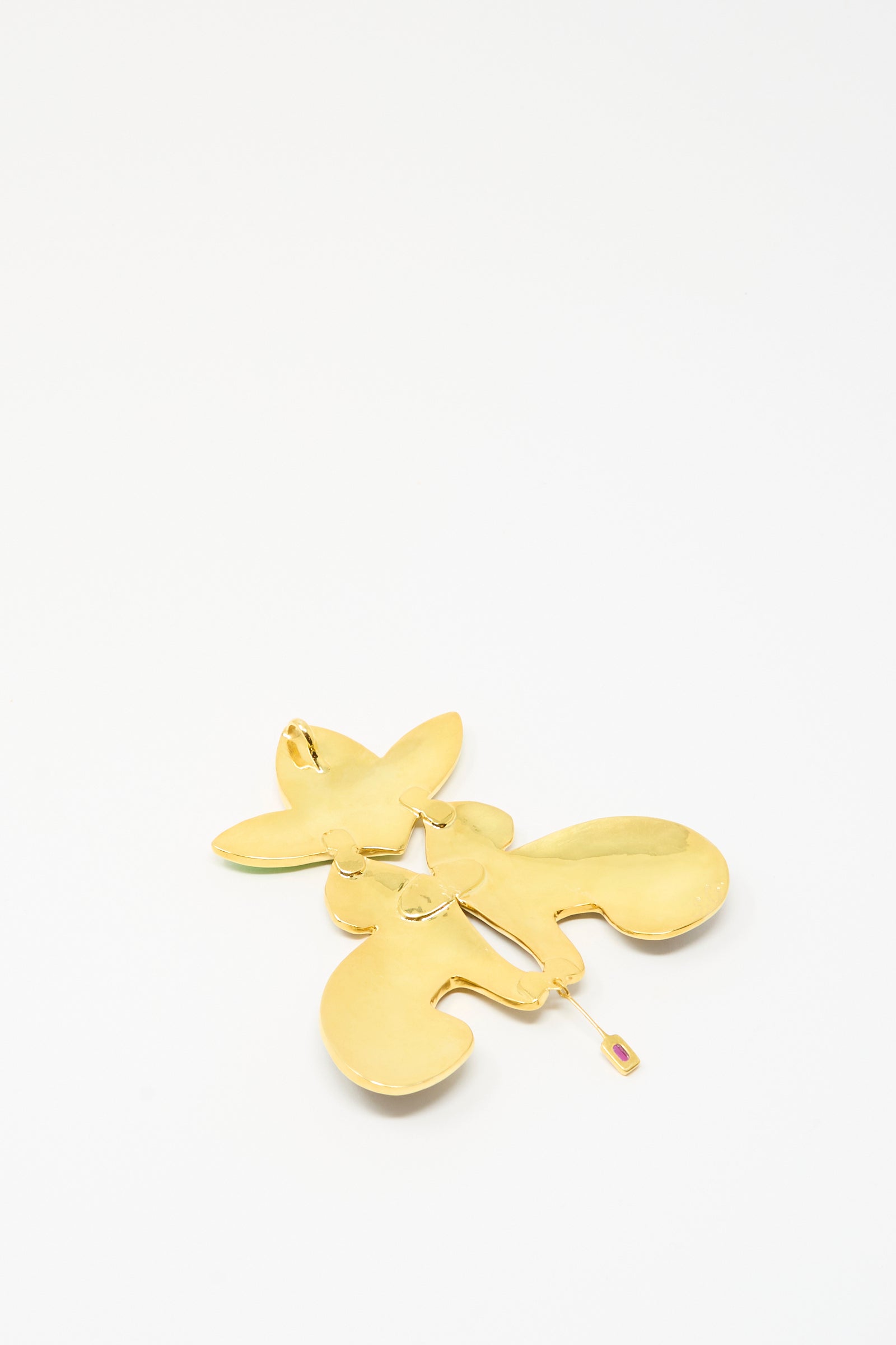Sofio Gongli Leopard and Flower Pendant earring with a gold-tone abstract shape, 14K gold plated finish, and dangling detail, shown on a plain white background.