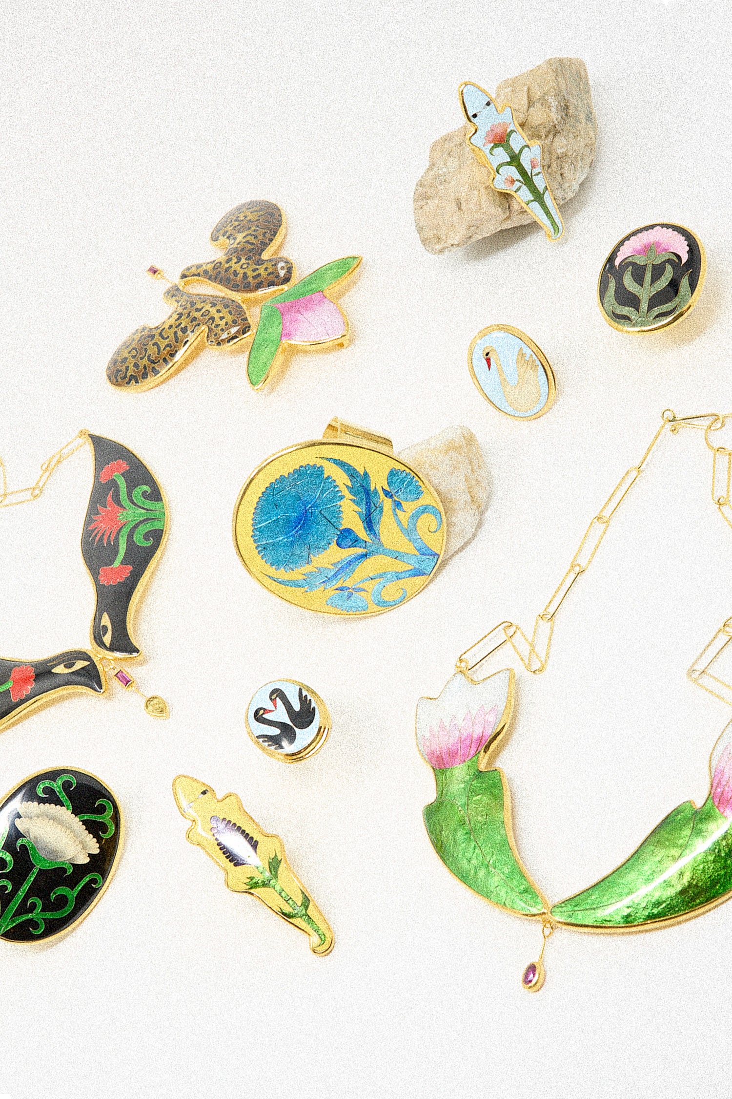 A collection of Sofio Gongli's one-of-a-kind jewelry on a white background.