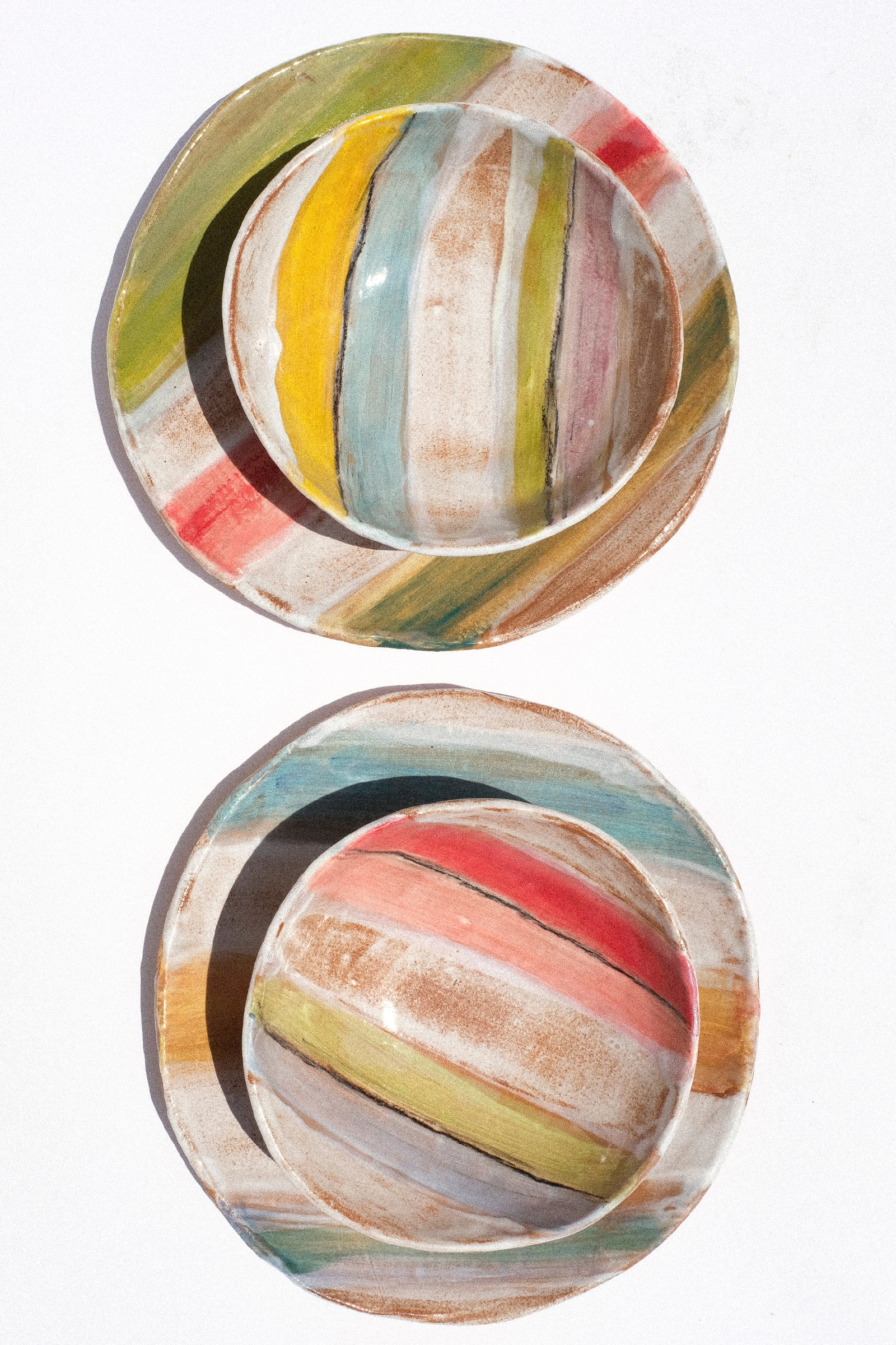 A still image of Shino Takeda's panted bowls and plates against a white background.