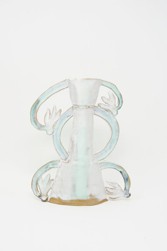 The Cyclamens Candle Holder in Green and White II by Tamar Mogendorff features two hand-shaped handles and a unique artisanal design, adding charm and artistry to any space.