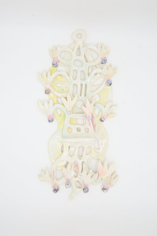 The Cyclamens Wall Piece by Tamar Mogendorff is a handmade ceramic art sculpture with abstract shapes, bird-like forms, pastel accents, and purple details—offering unique Brooklyn-made decor.