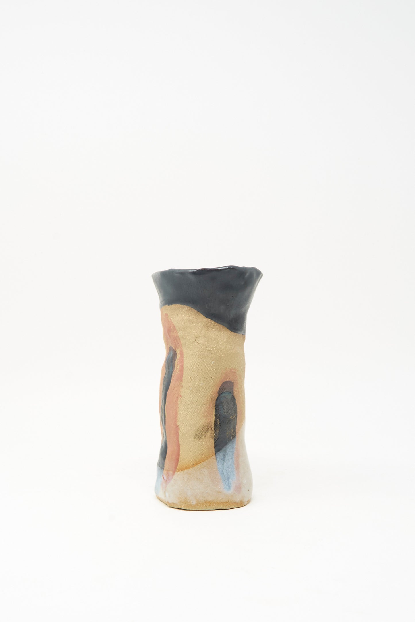 I wish I knew them Candleholder I by Tamar Mogendorff—an expertly crafted handmade ceramic candleholder with a narrow neck, featuring abstract patterns in beige, black, blue, and reddish tones. Made in Brooklyn and shown against a plain white background.