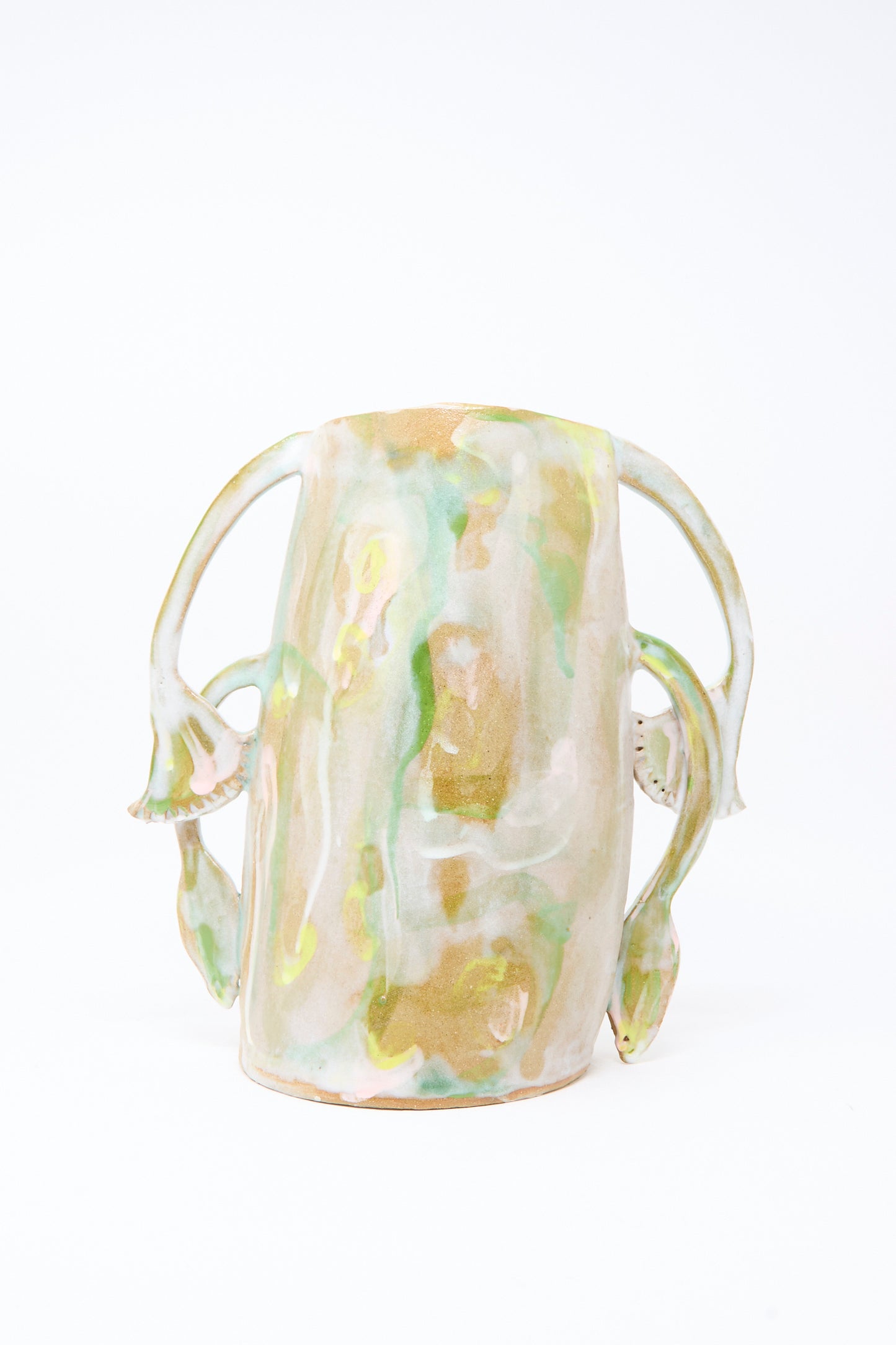The Papyrus Bloom Vase by Tamar Mogendorff is a handmade Brooklyn ceramic vase with an abstract green, yellow, and cream marbled pattern and three curved floral handles resembling flower stems.