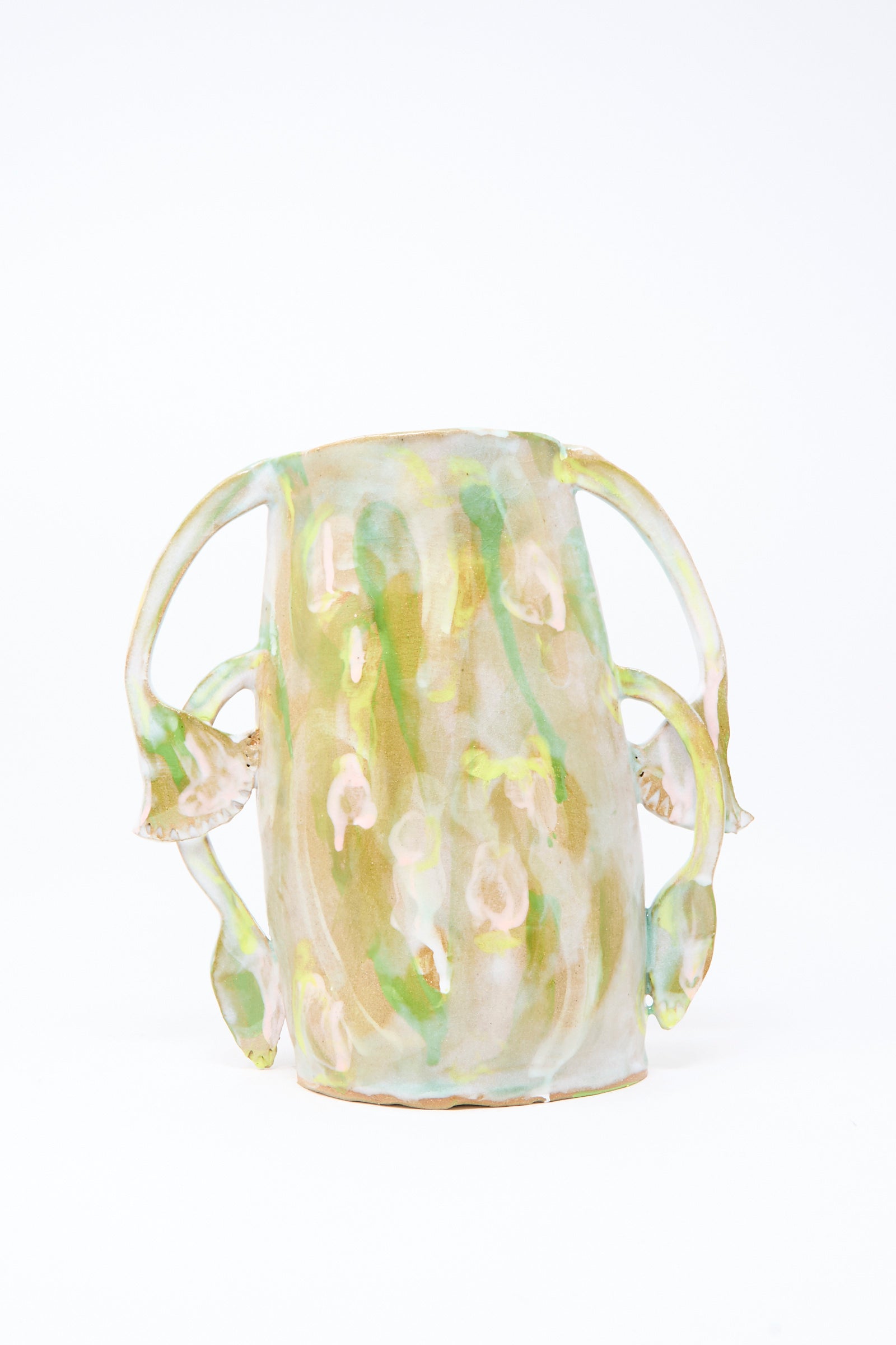 Handmade in Brooklyn, the Papyrus Bloom Vase by Tamar Mogendorff features a glossy green and beige marbled ceramic finish with four outward-curving floral handles.