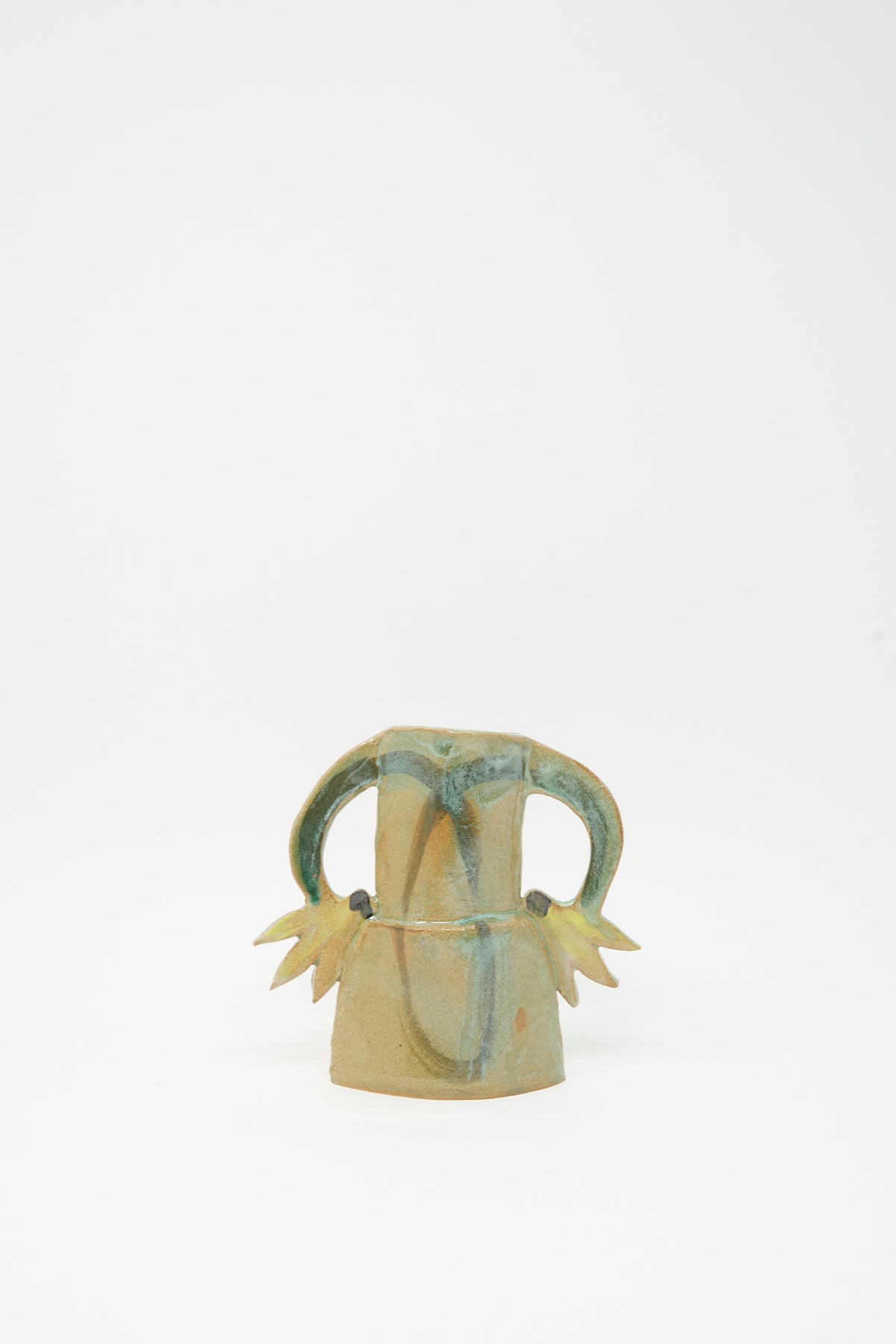Tamar Mogendorff Two Cyclamens Vase in Celadon Green I, a handmade ceramic vase with two handles and stylized leaf accents at the base.