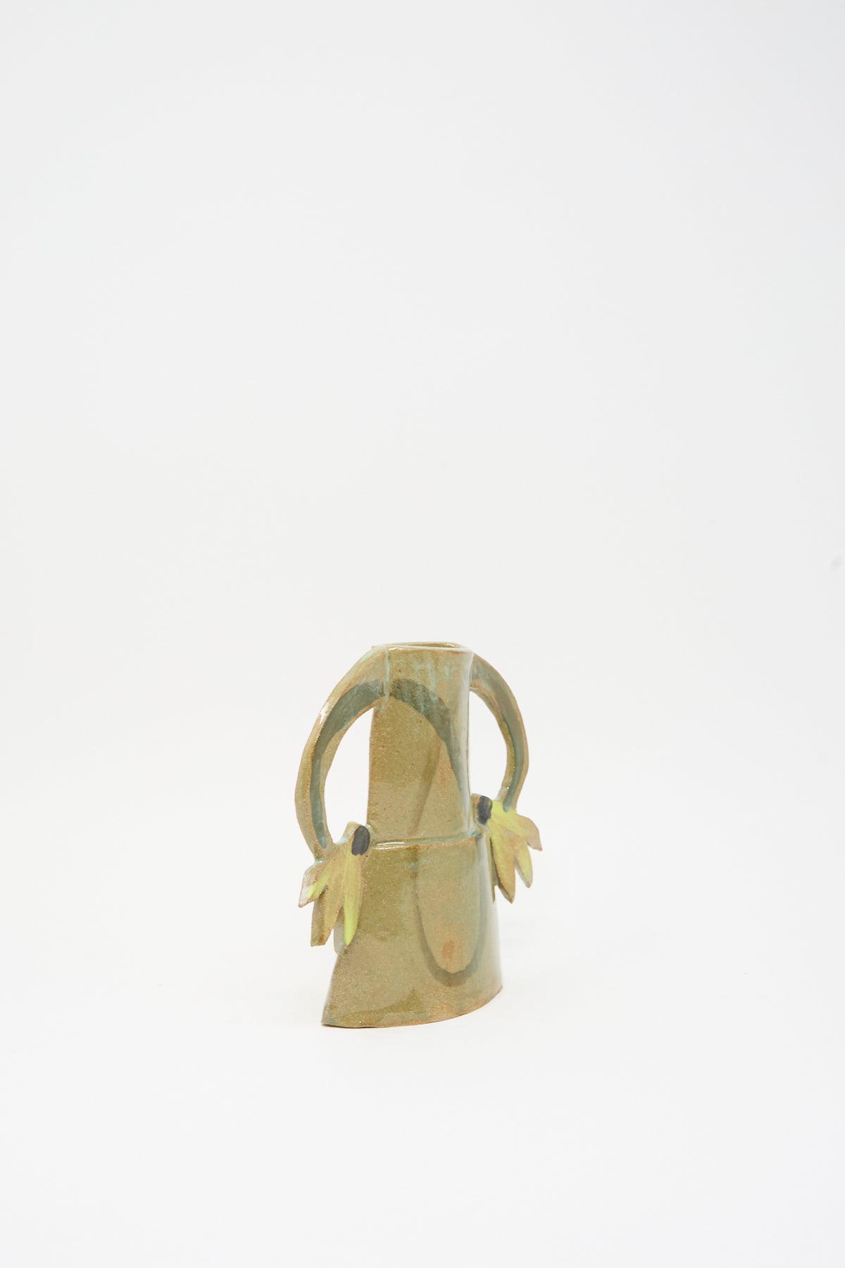 A Two Cyclamens Vase in Celadon Green II, a handmade celadon green ceramic vase with two decorative handles.
