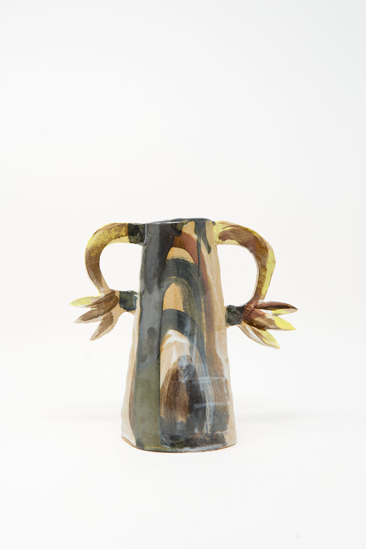 Handcrafted in Brooklyn by Tamar Mogendorff, the Two Cyclamens on Top of a Mountain Vase showcases a wide conical ceramic form with a multicolored abstract glaze and two curved handles, each detailed with yellow and brown accents.