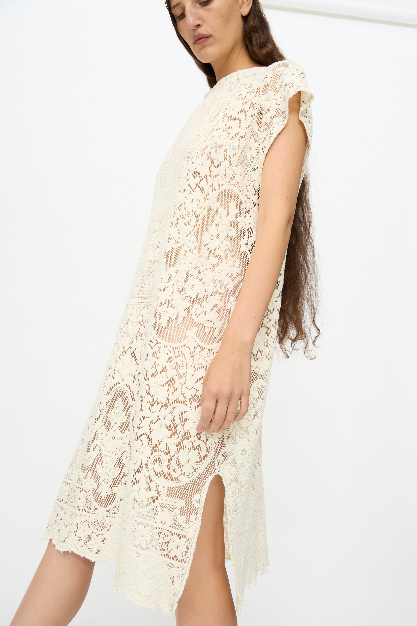 A person wearing the Quaker Lace Caftan Midi Pullover by Thank You Have A Good Day stands against a plain white background.