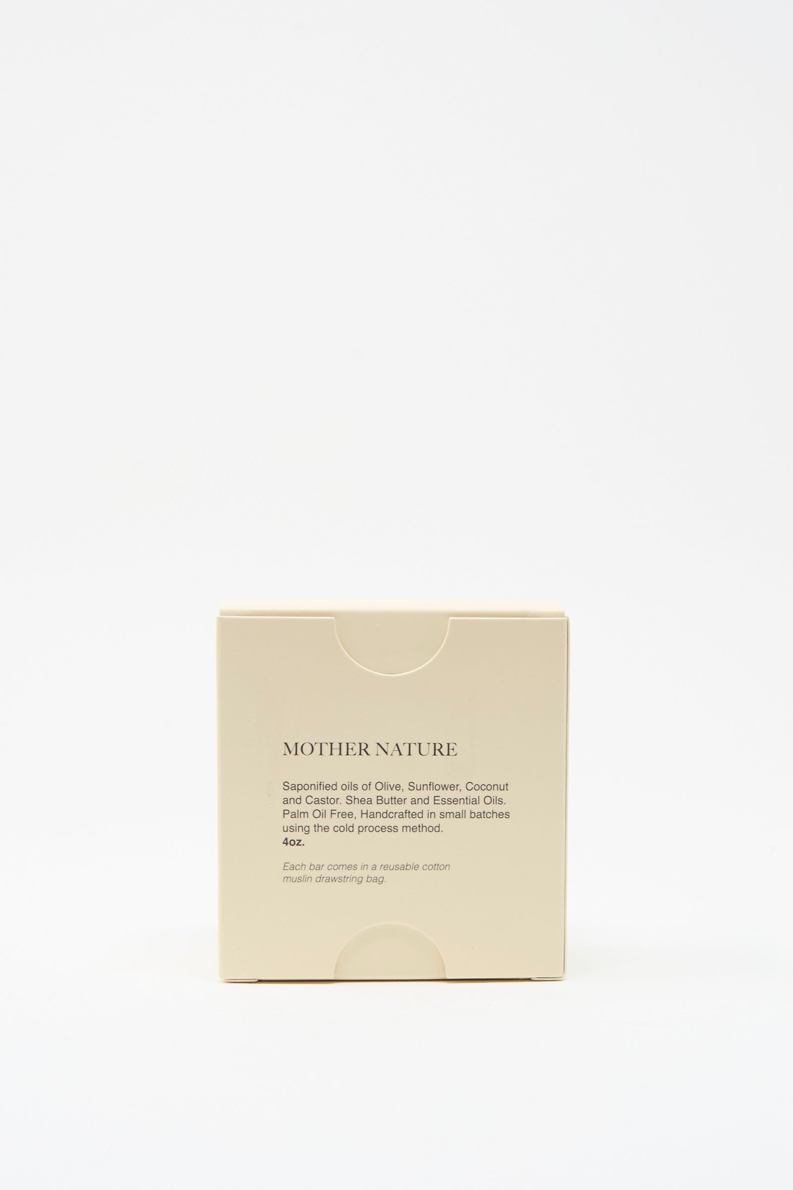 A beige box labeled "Mother Nature Wild Pistachio Soap Bar" by The Quiet Botanist, featuring vegan ingredients—olive, sunflower, coconut, and castor oils—sits centered on a white background; handmade in Turkey.