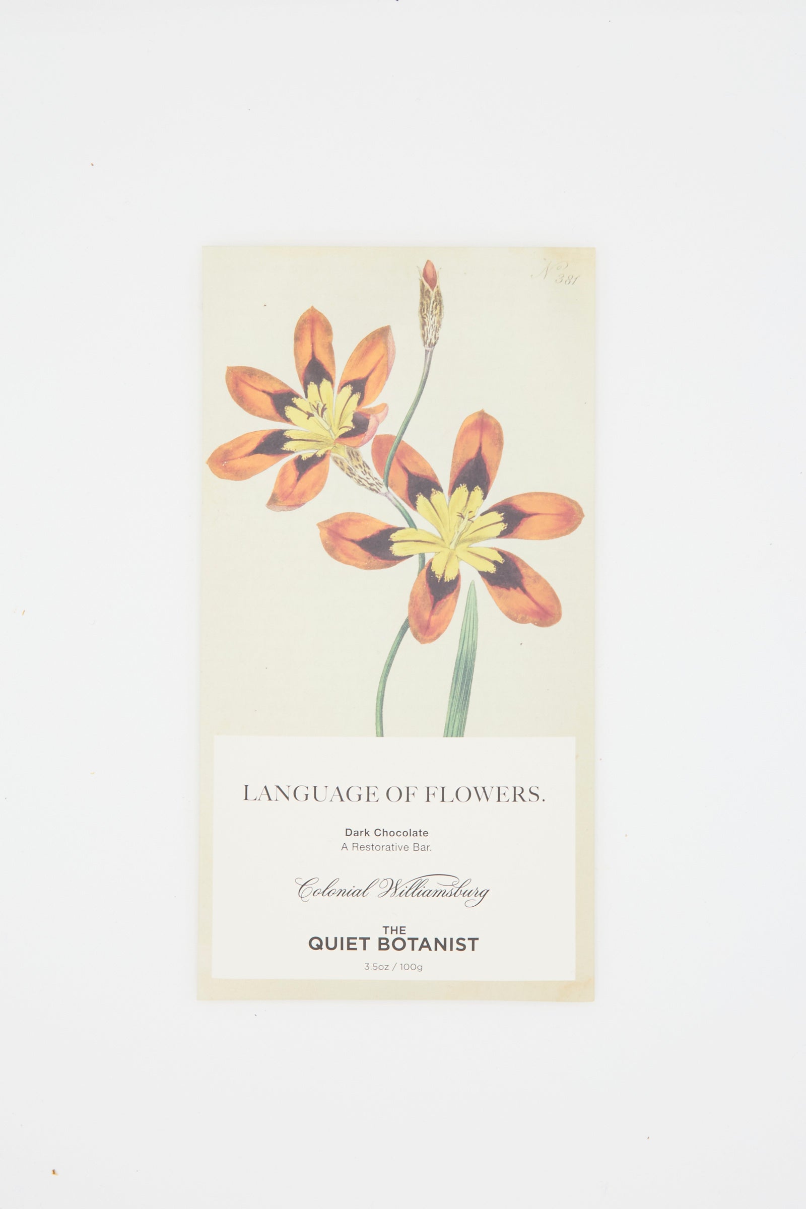 The Quiet Botanist's 5 oz Language of Flowers Bar features a delicate botanical illustration and contains dark chocolate infused with soothing skullcap.