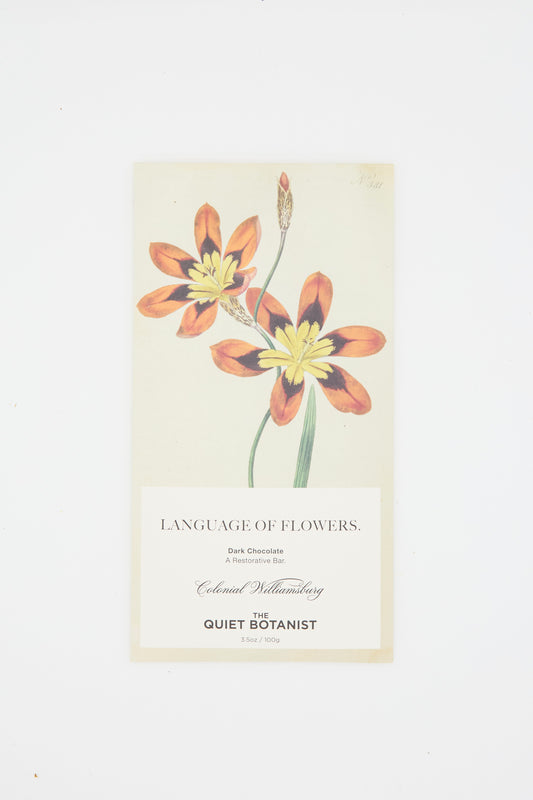 The Quiet Botanist's 5 oz Language of Flowers Bar features a delicate botanical illustration and contains dark chocolate infused with soothing skullcap.