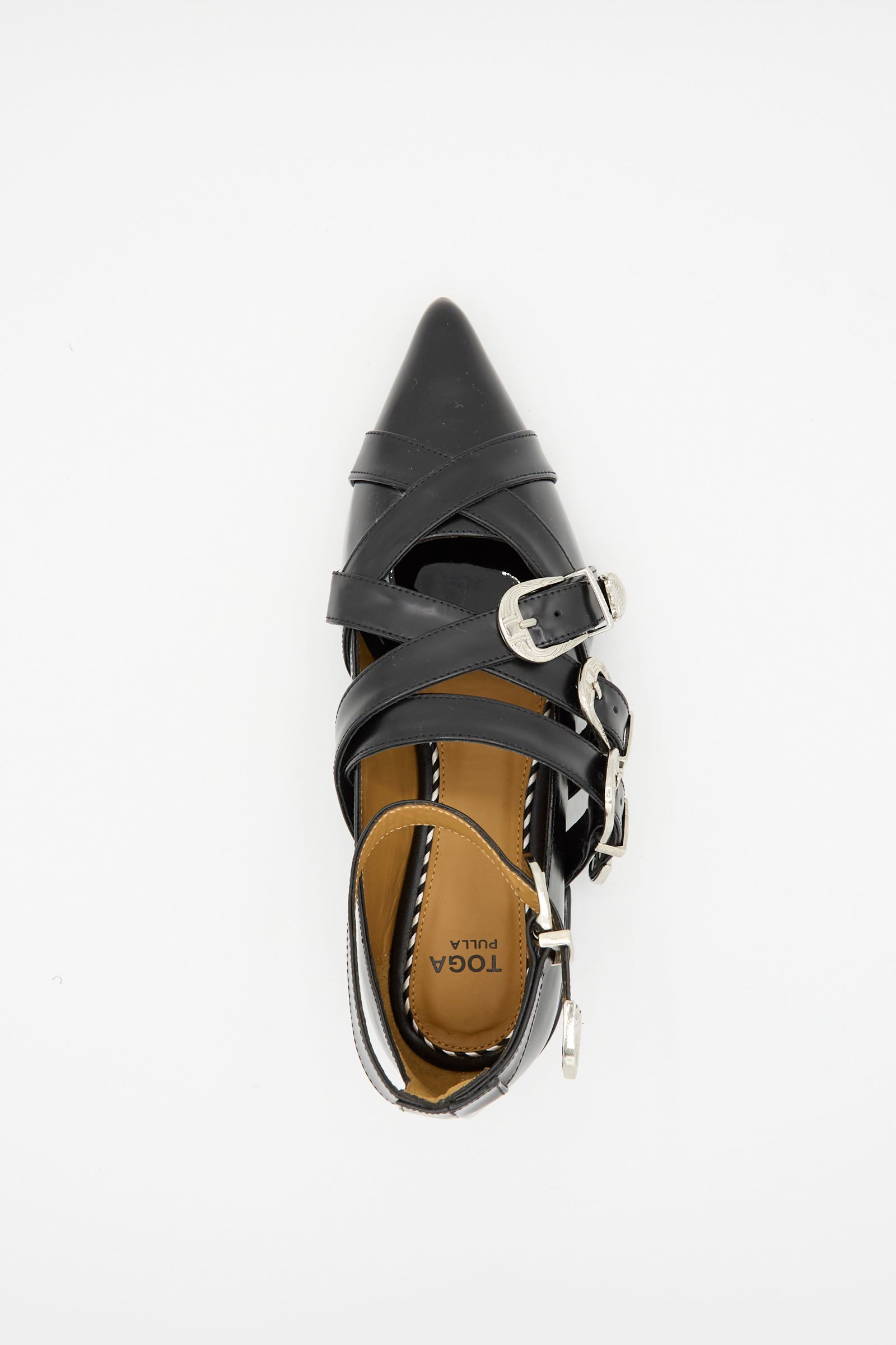 Top view of TOGA ARCHIVES' Leather Polido Flat in Black, showcasing a pointed toe with multiple ankle straps and silver buckle accents.