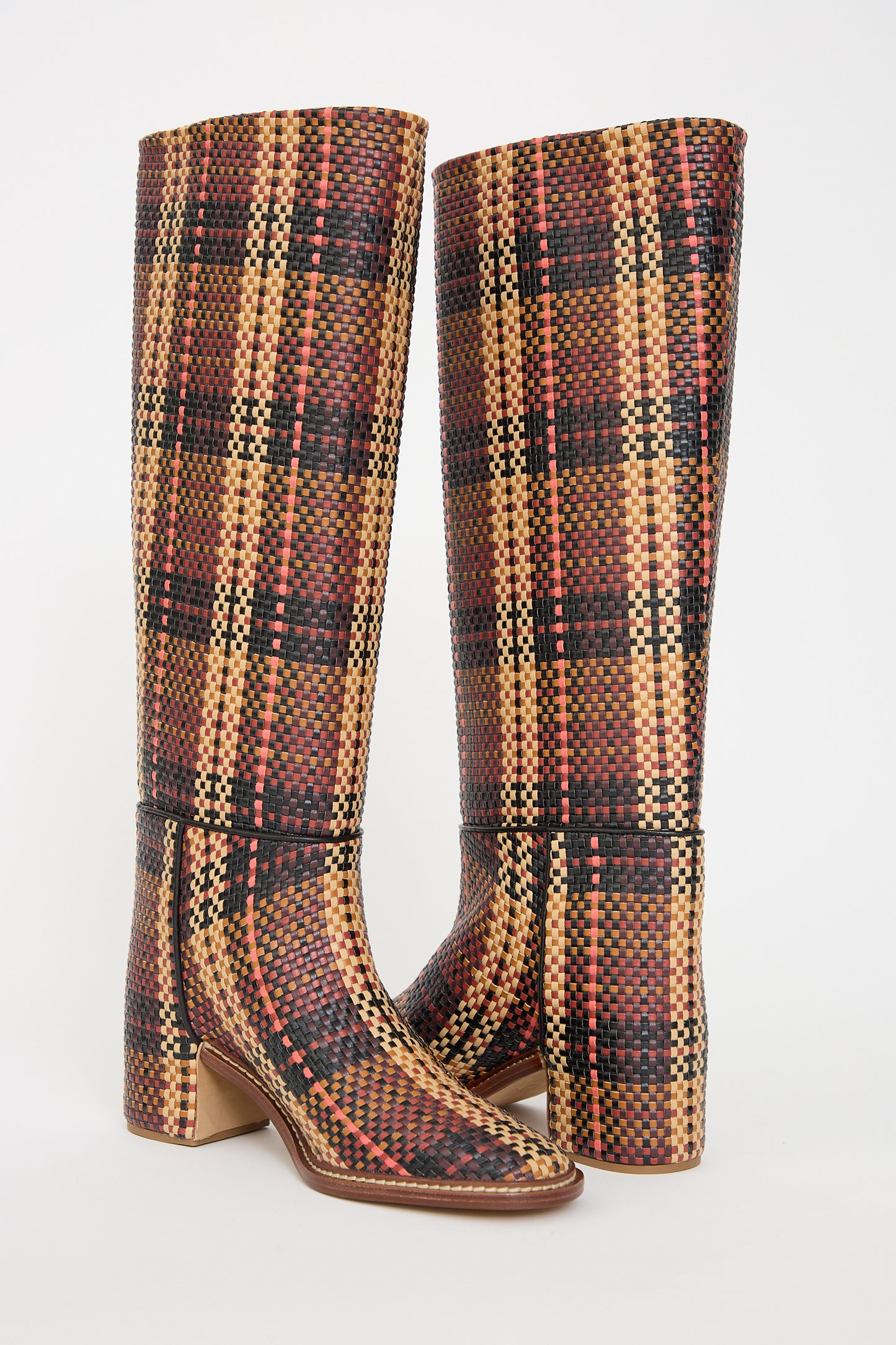 Ulla Johnson's Elena Woven Riding Boot in Brown made of vegan leather with block heels against a white background.