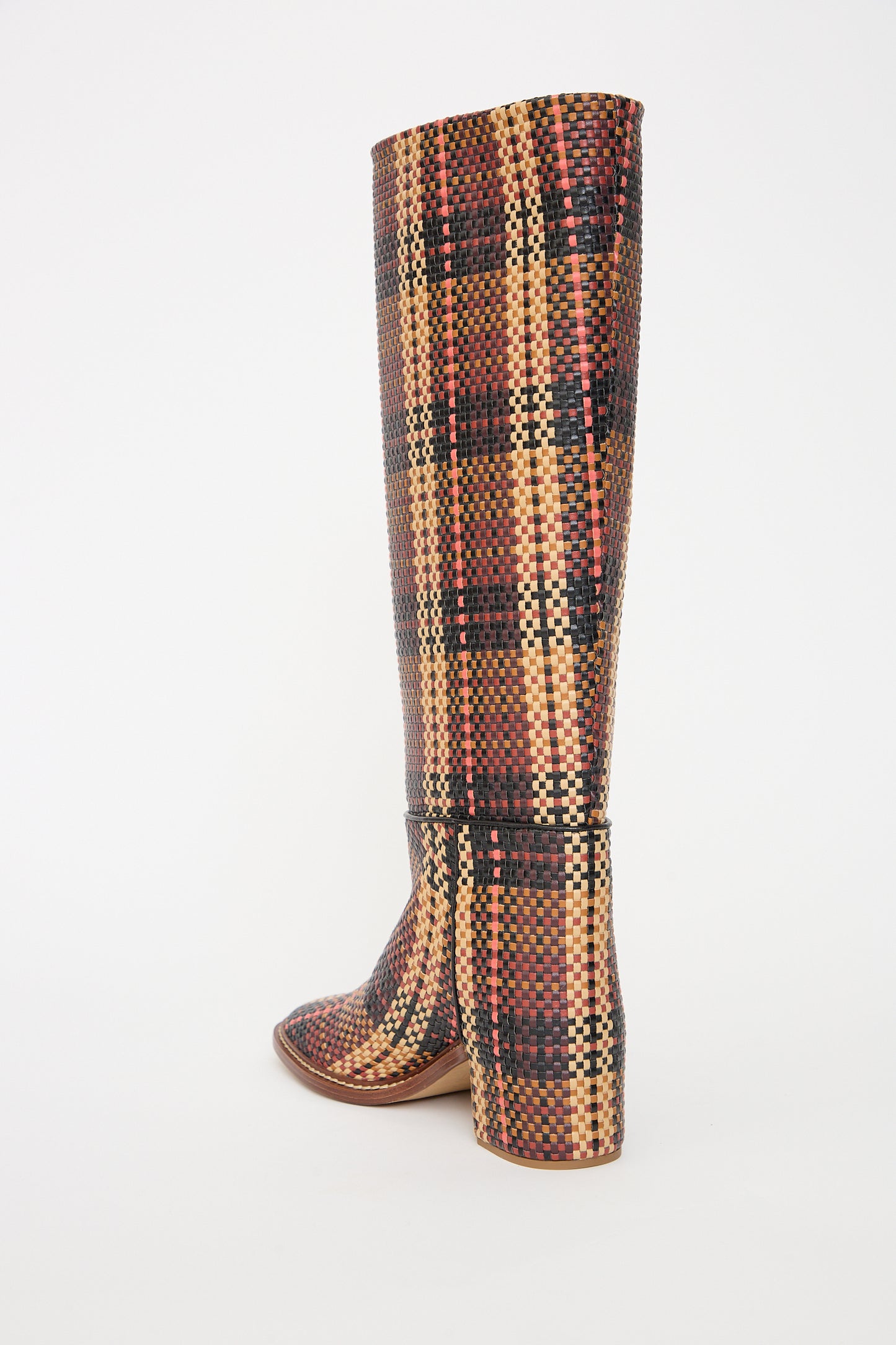 Tall, multicolored checkered-pattern vegan leather Ulla Johnson Elena Woven Riding Boots in Brown against a white background.