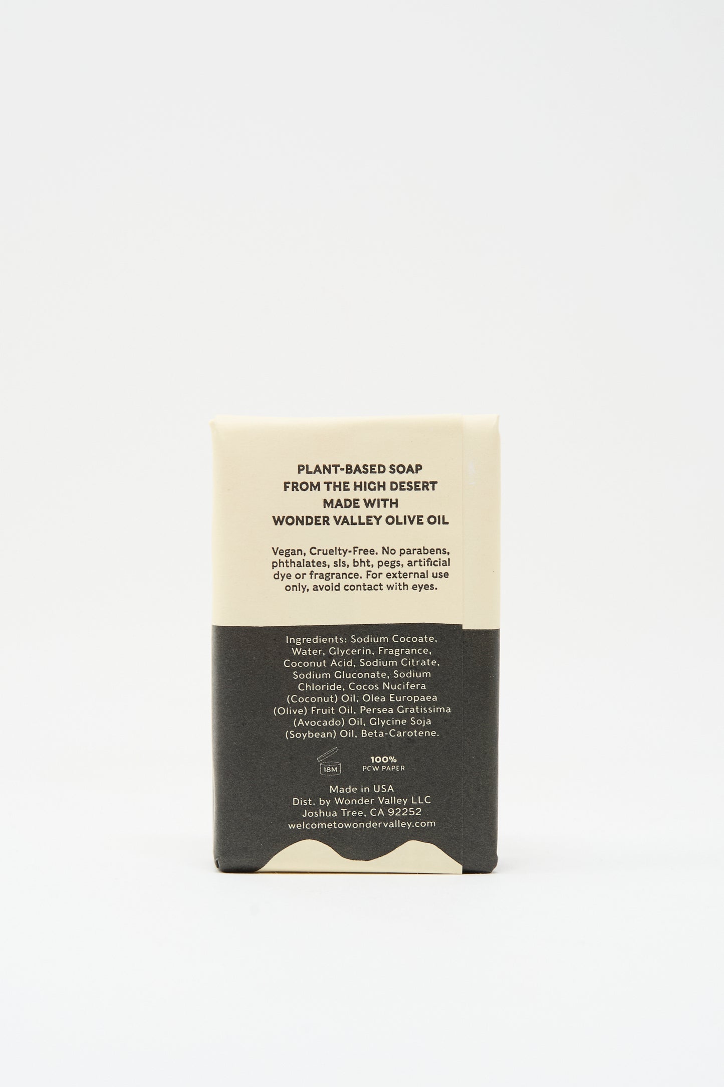 Two Deserts Soap by Wonder Valley is a rectangular, moisturizing plant-based bar in minimalist packaging. Its vegan formula, made with nourishing Wonder Valley Olive Oil, is detailed on the label.