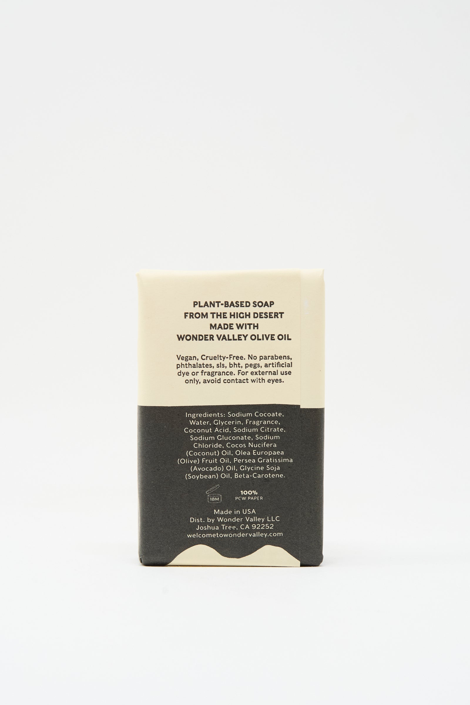 Two Deserts Soap by Wonder Valley is a rectangular, moisturizing plant-based bar in minimalist packaging. Its vegan formula, made with nourishing Wonder Valley Olive Oil, is detailed on the label.