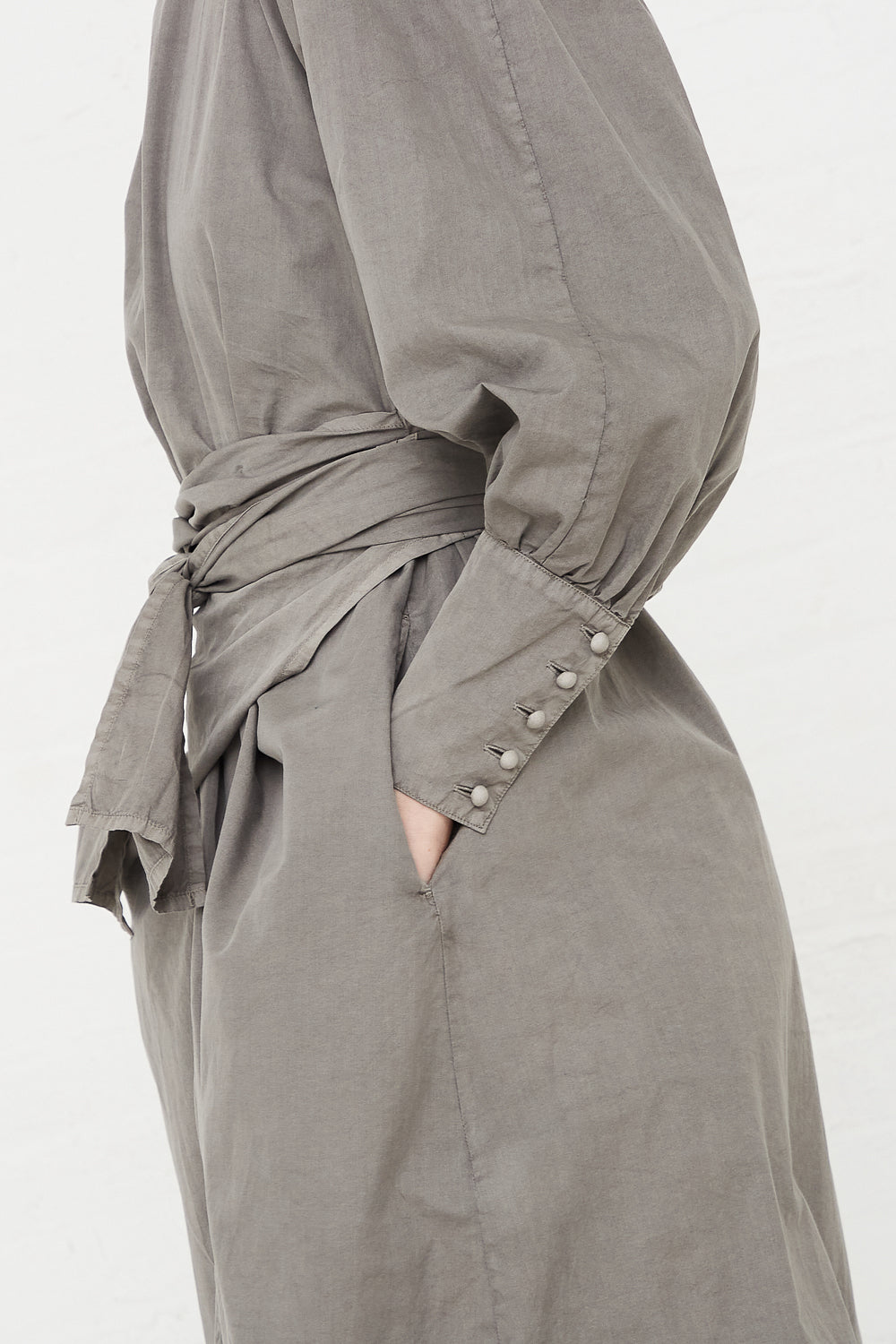 Cosmic Wonder - Suvin Cotton Broadcloth Wrapped Dress in Sumi sleeve cuff button detail
