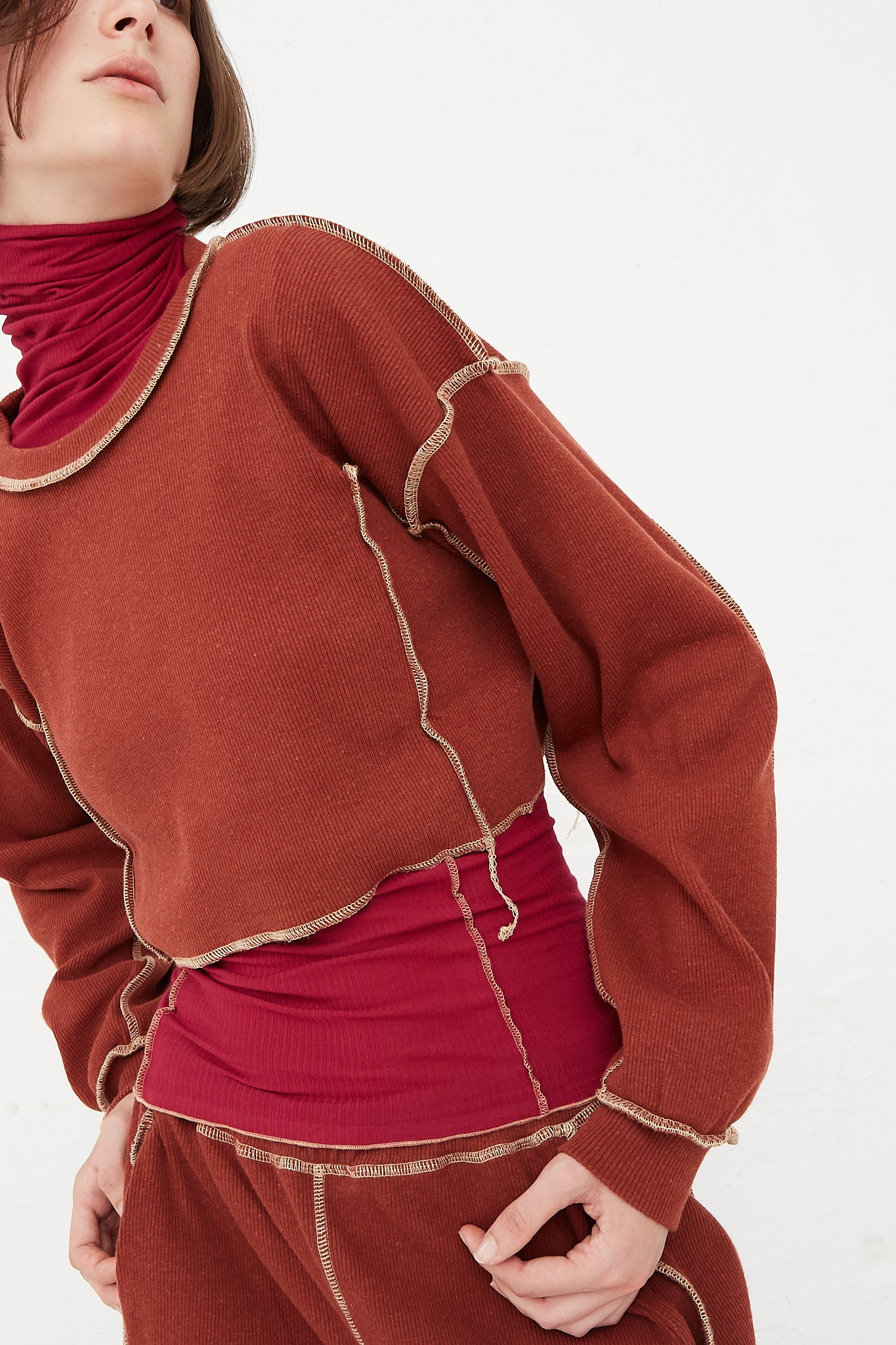 Baserange - Omato Sweatshirt in Burned Punica sleeve detail