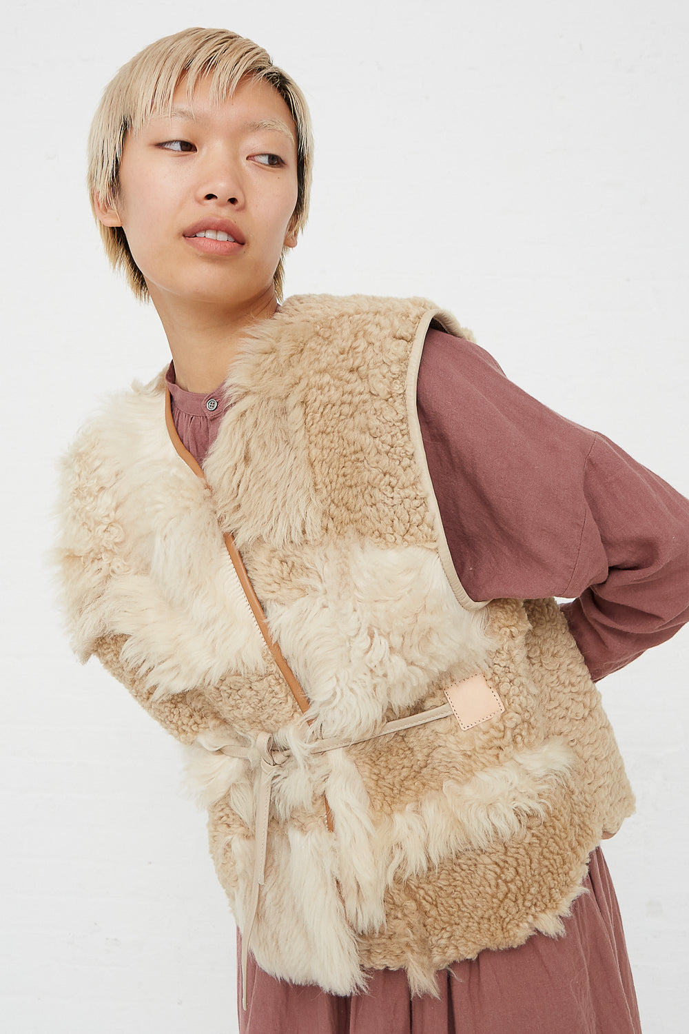 Milena Silvano - Sheepskin Transition Vest Patchwork Multi A front view with belt tied
