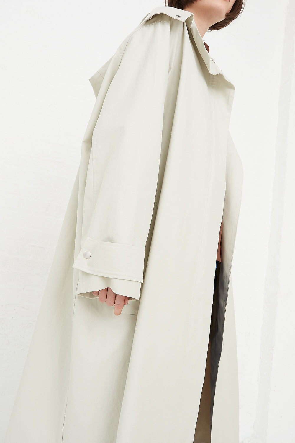 Studio Nicholson - Tana Raincoat in Dove sleeve detail side view